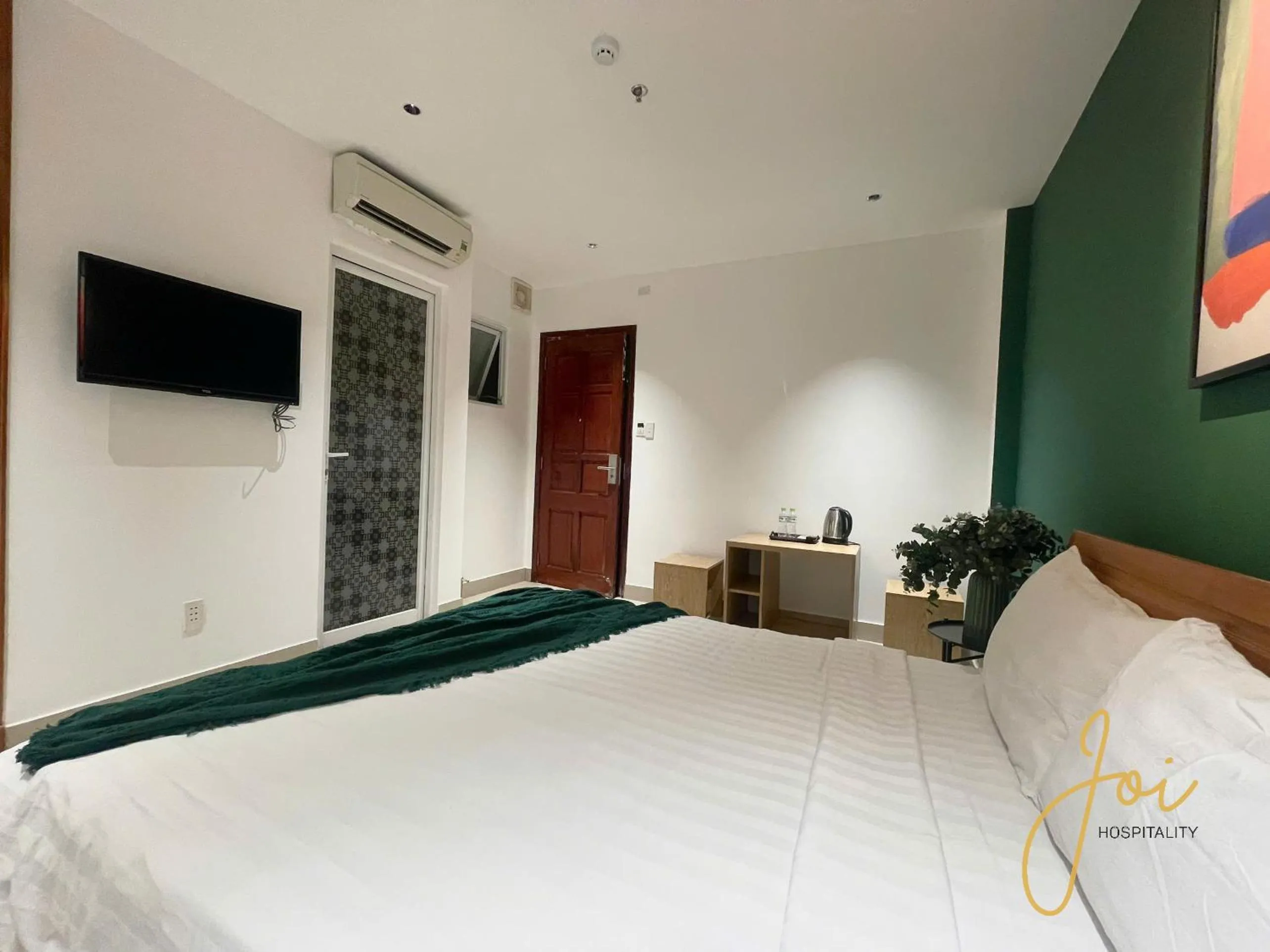 Bed in Joi Hospitality - Anthony