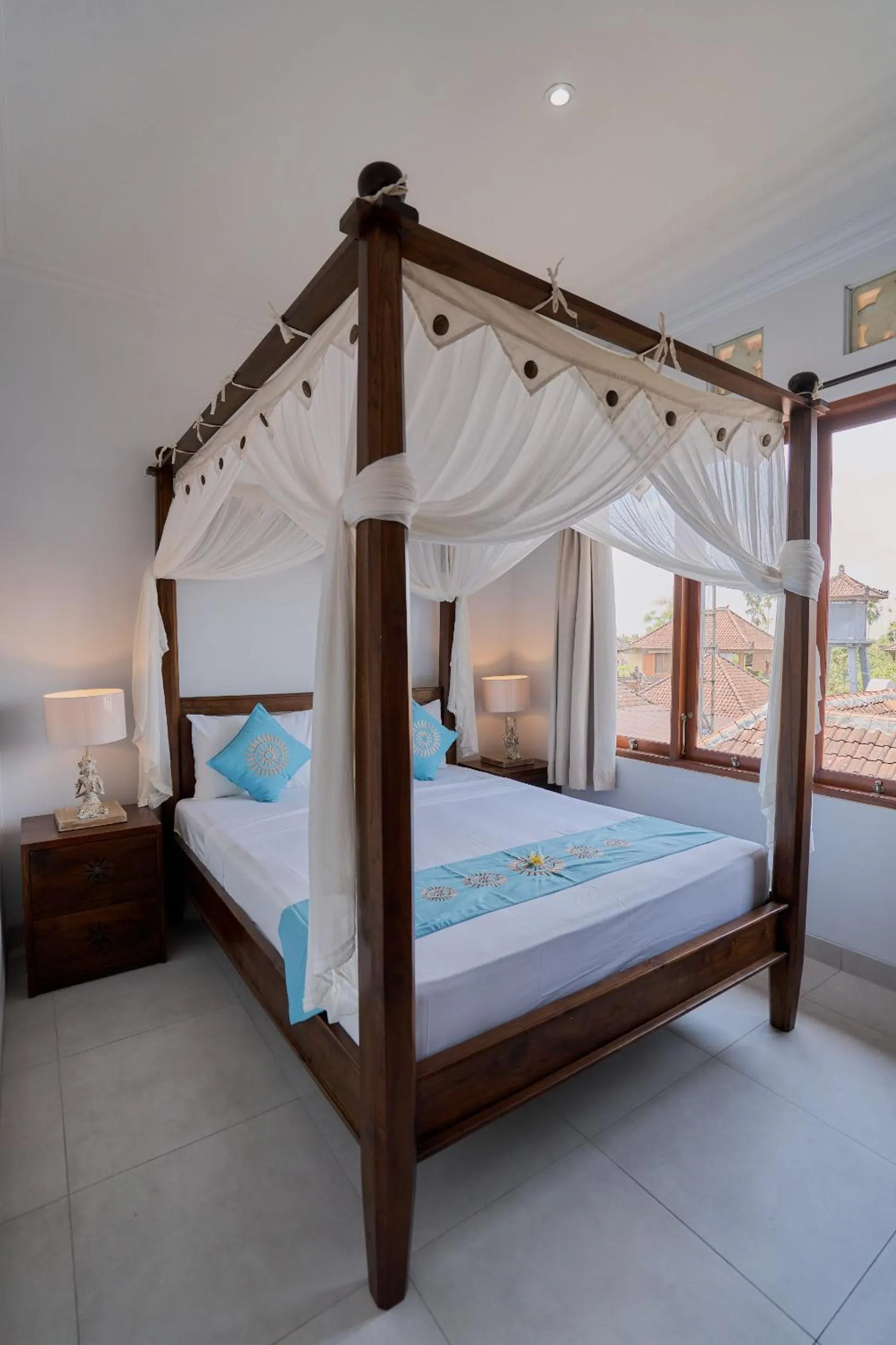 Bed in Sama's Cottages and Villas