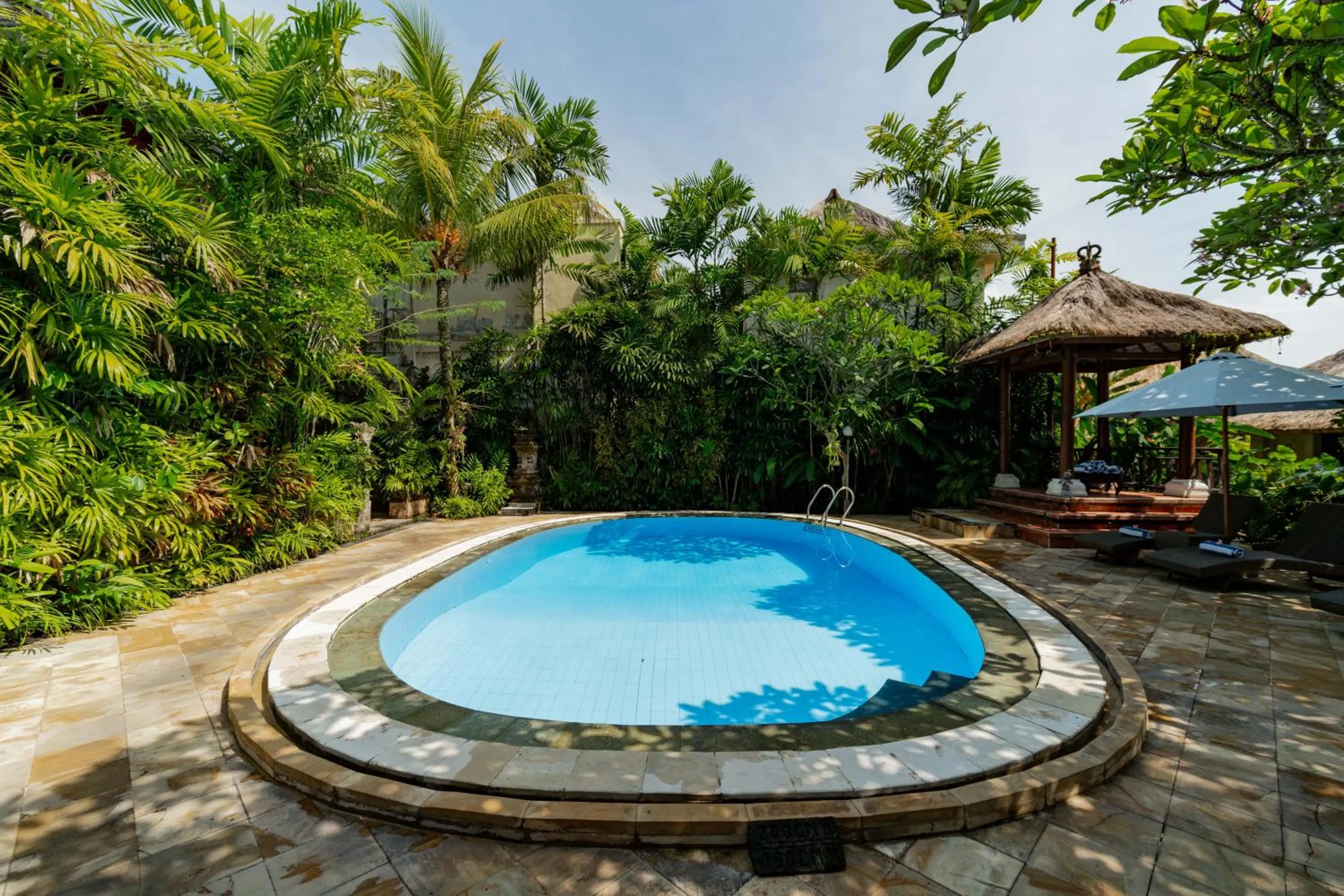 Swimming pool in Sama's Cottages and Villas