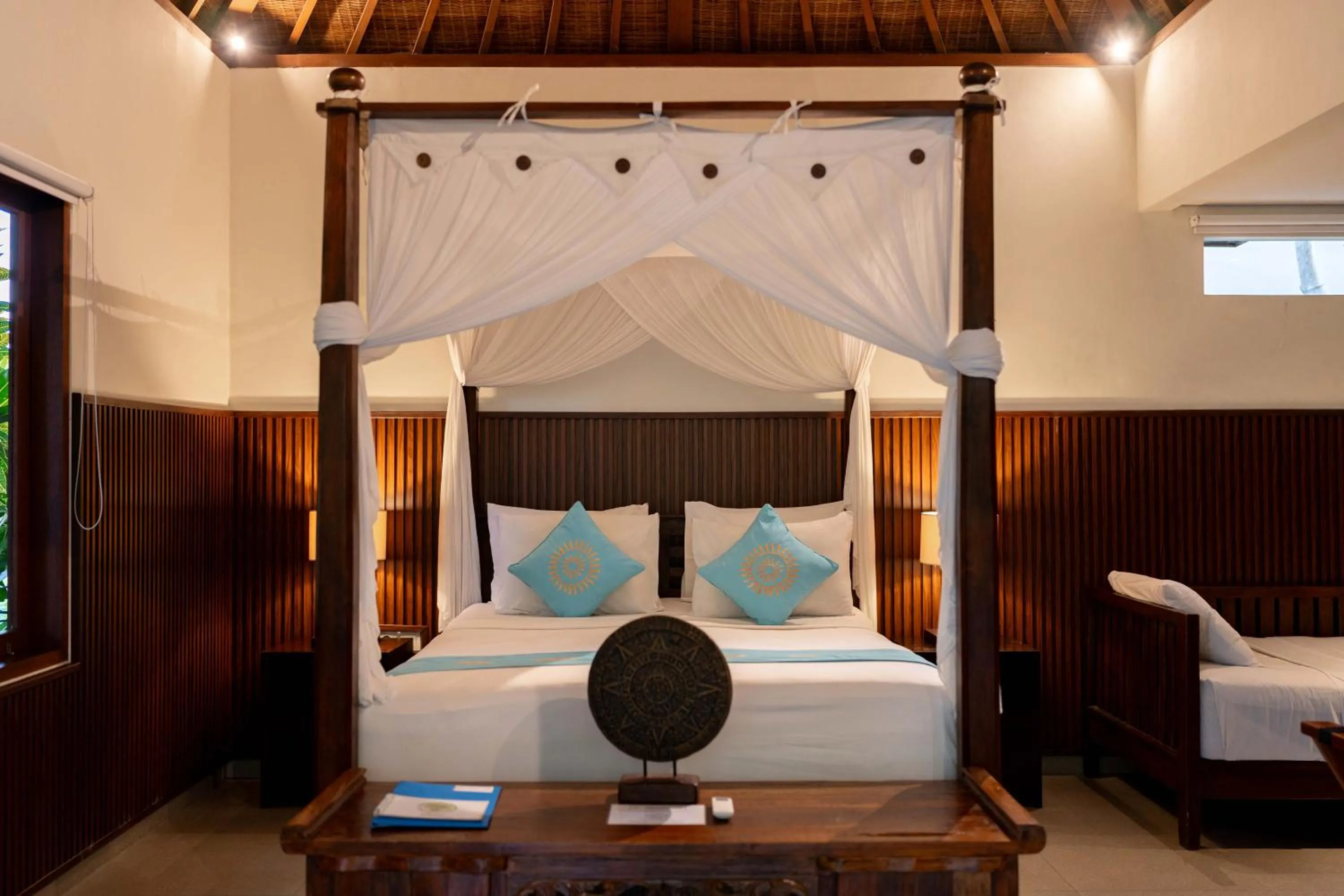 Bed in Sama's Cottages and Villas
