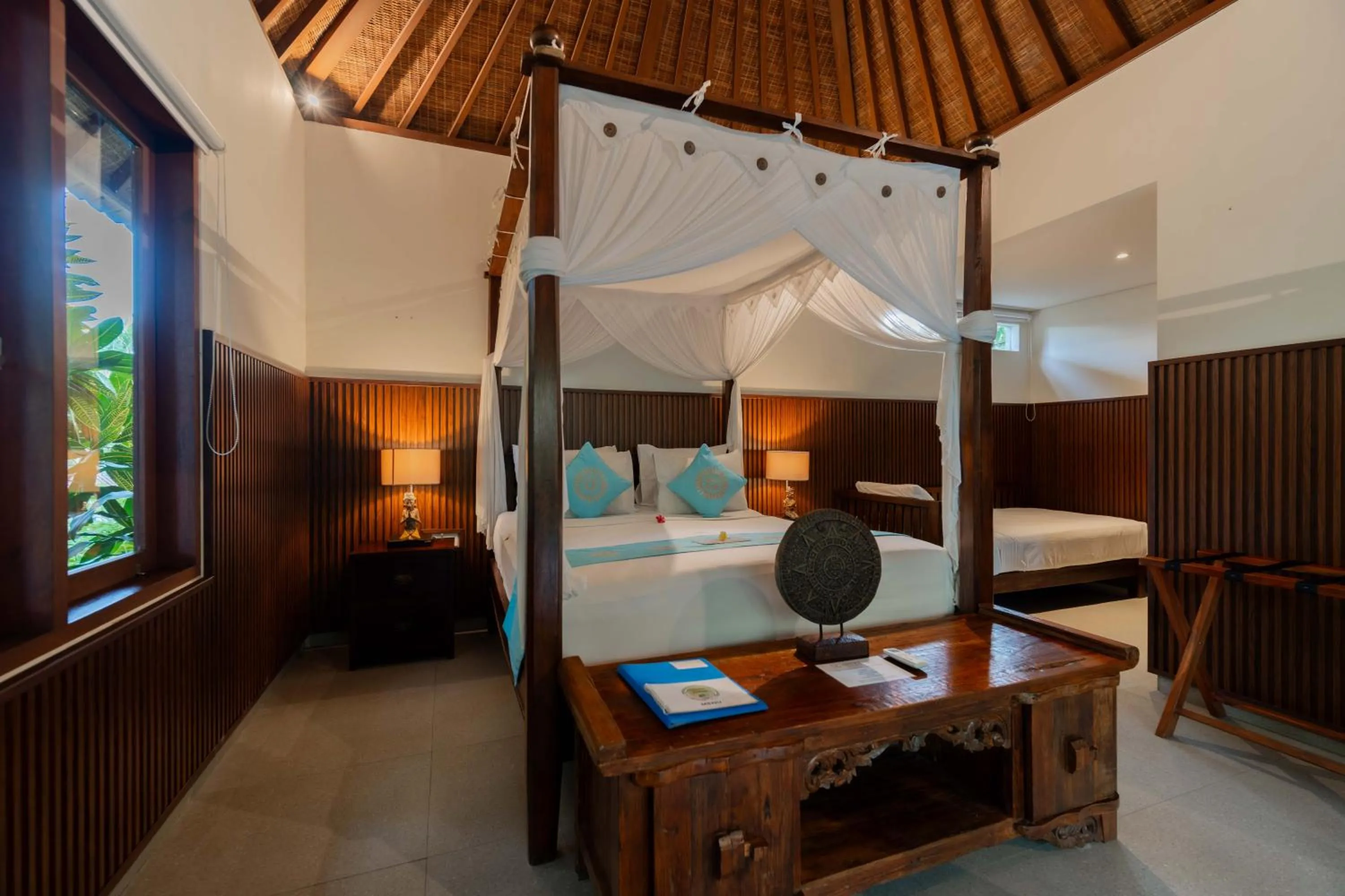 Bed in Sama's Cottages and Villas