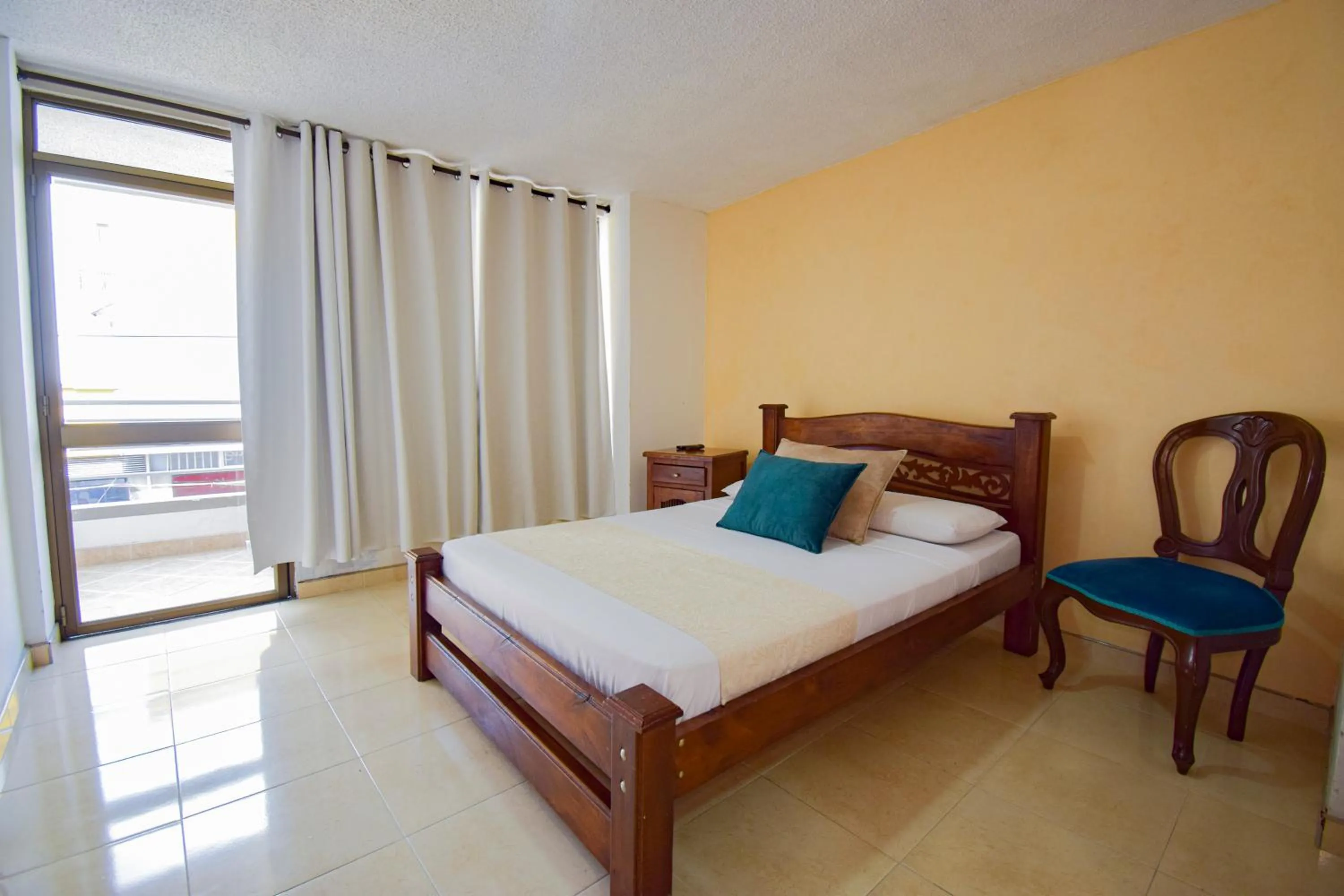 Bed in Hotel Toledo Plaza