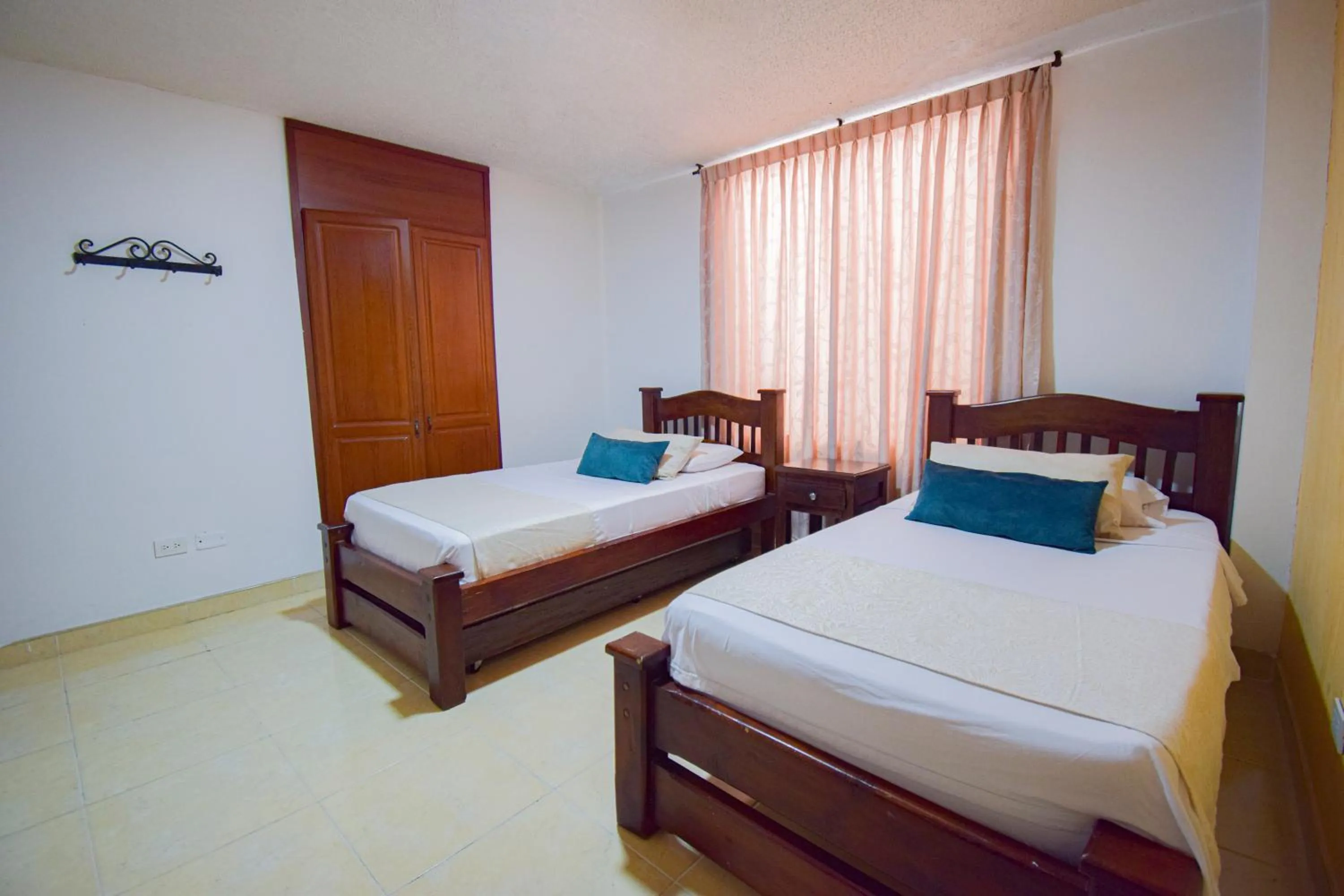 Bed in Hotel Toledo Plaza