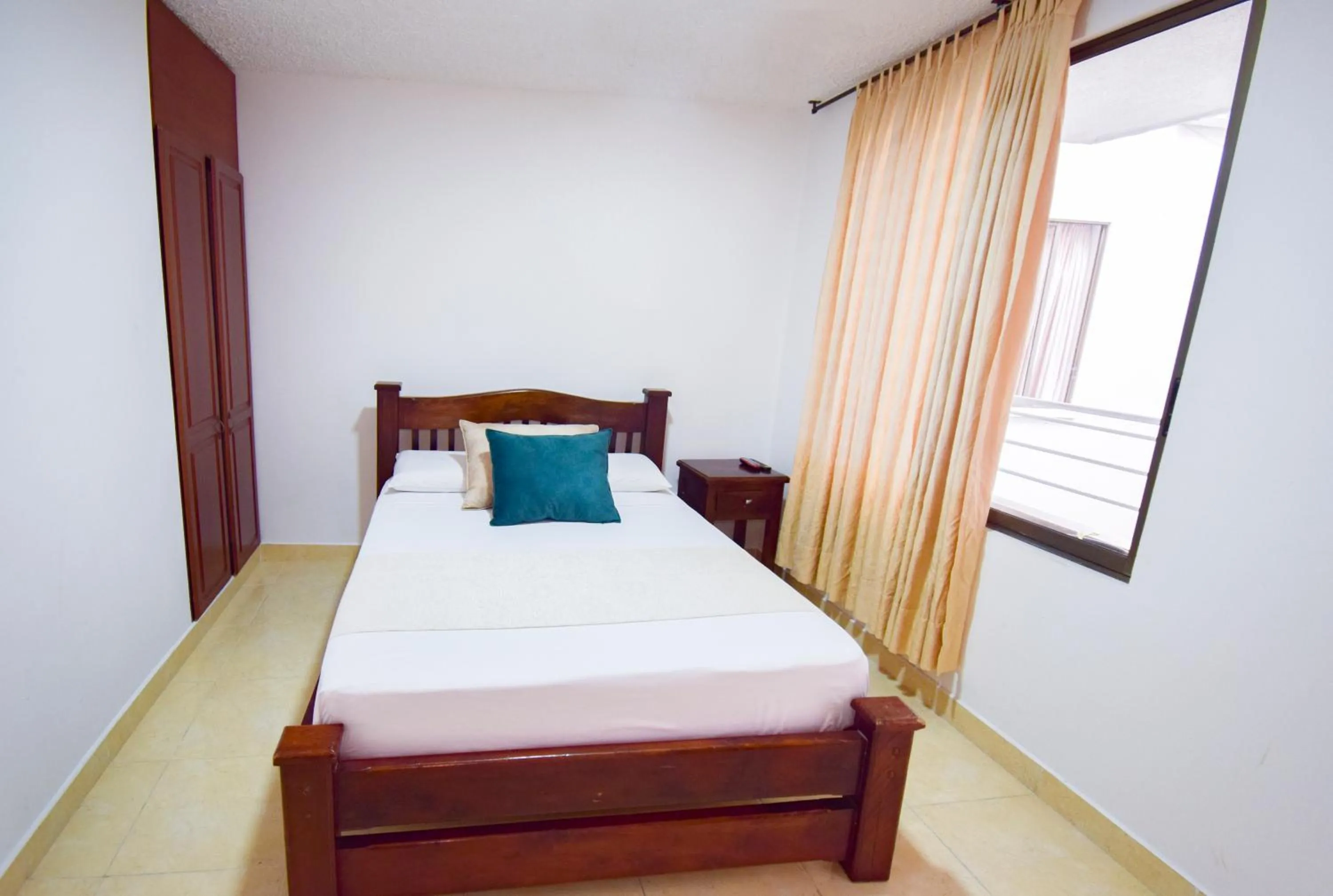 Bed in Hotel Toledo Plaza