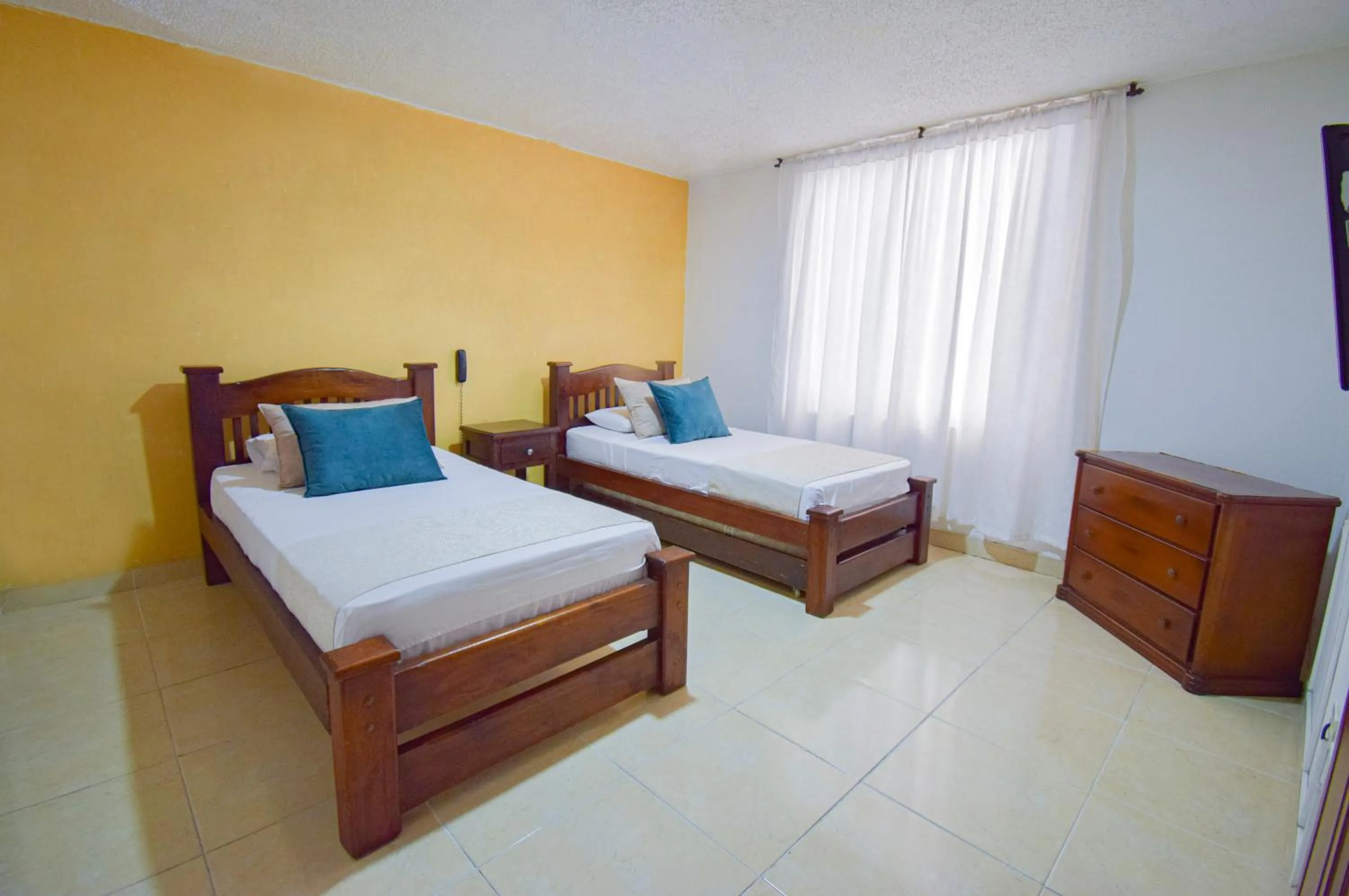 Bed in Hotel Toledo Plaza