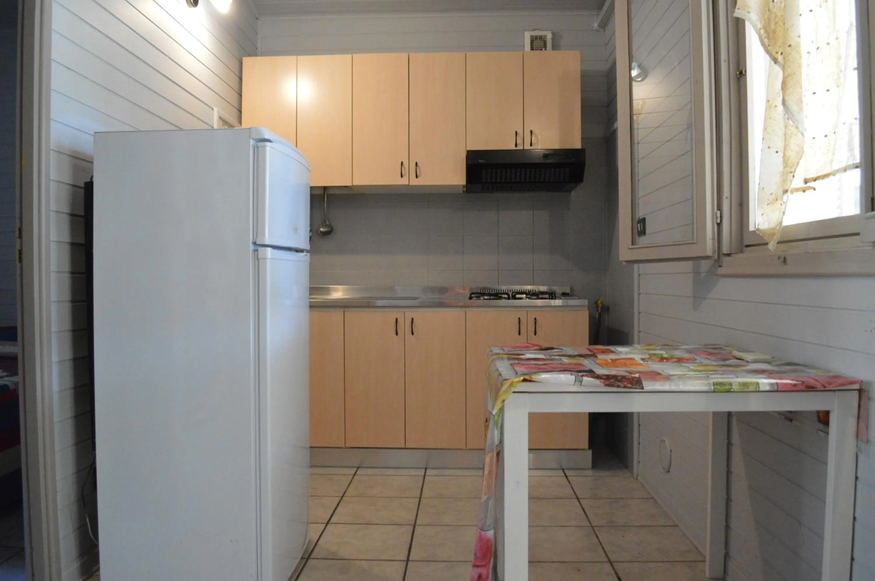 Kitchen or kitchenette in Riva dei Greci Camping Village