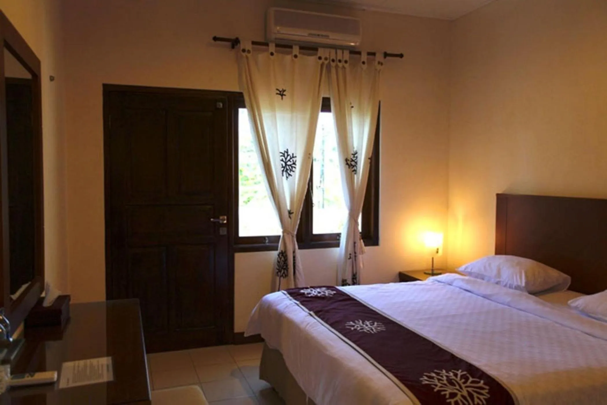 Bed in Niramaya Villa