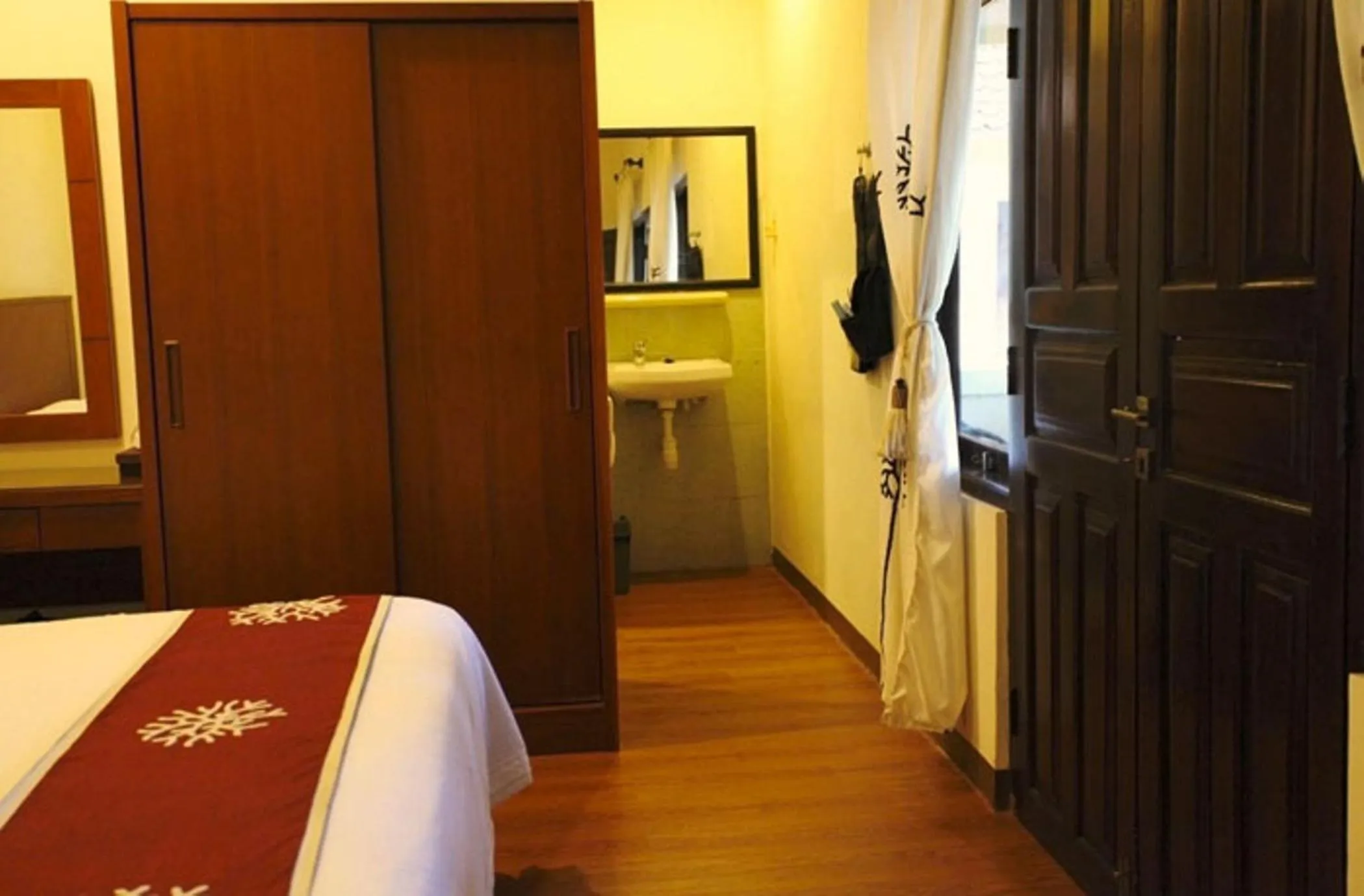 Bed in Niramaya Villa