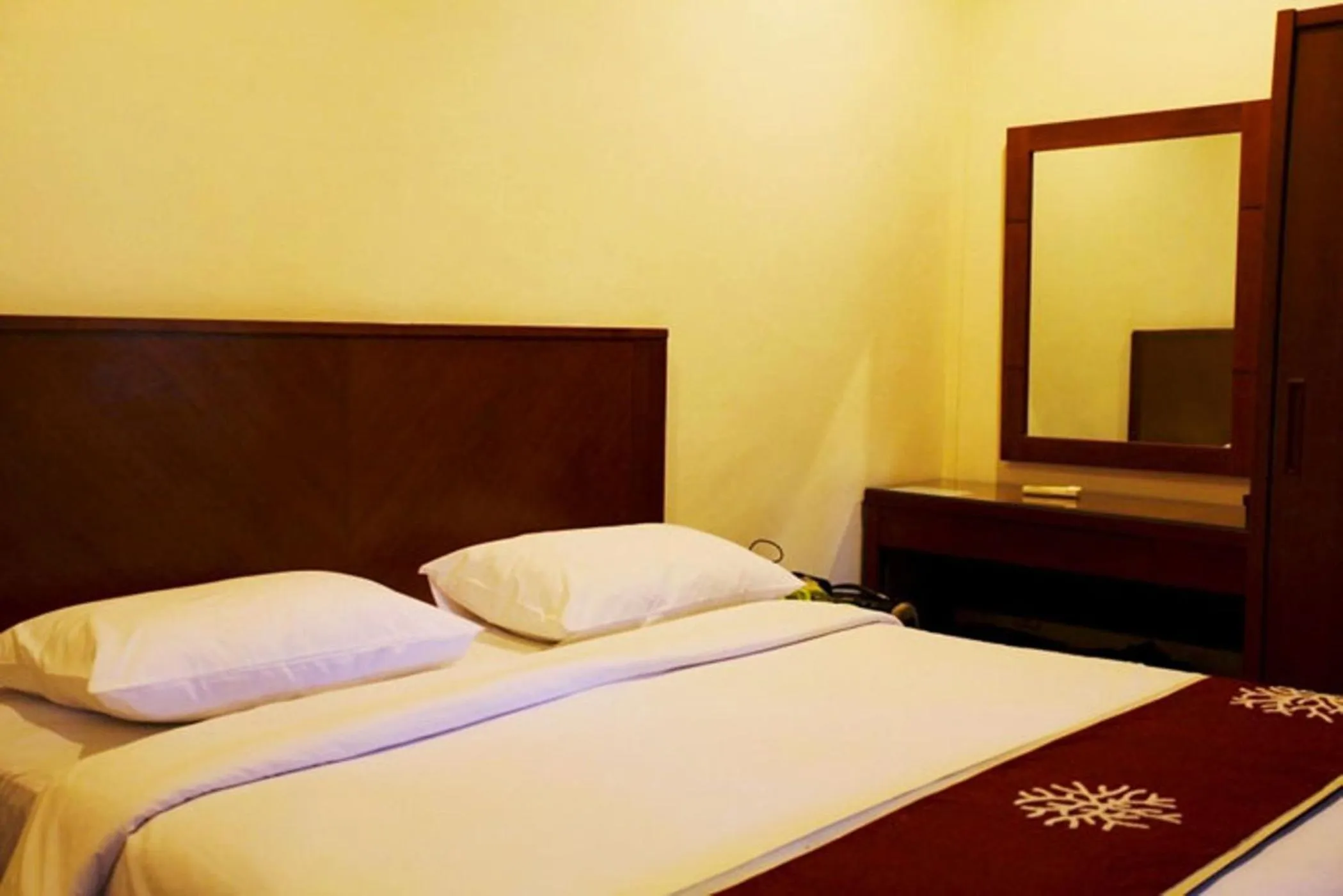 Bed in Niramaya Villa