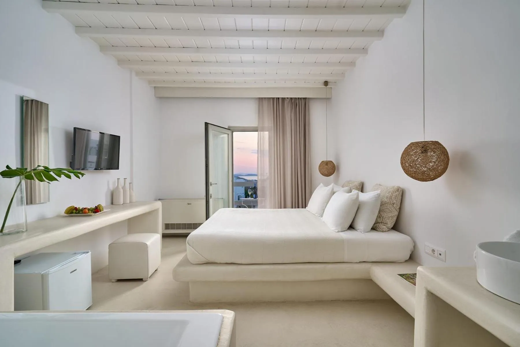 Bed in Paolas Τown Boutique Hotel