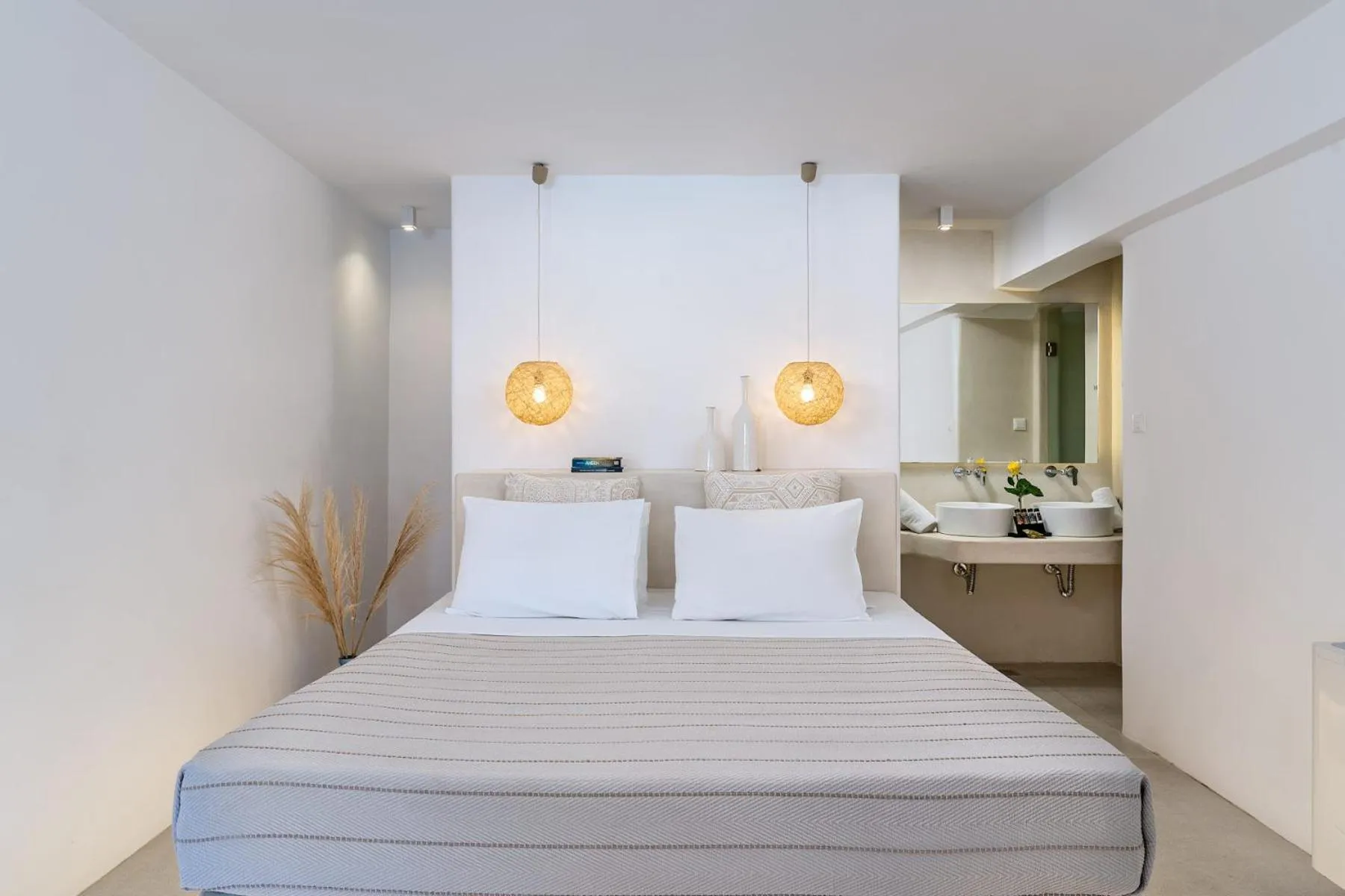Bed in Paolas Τown Boutique Hotel