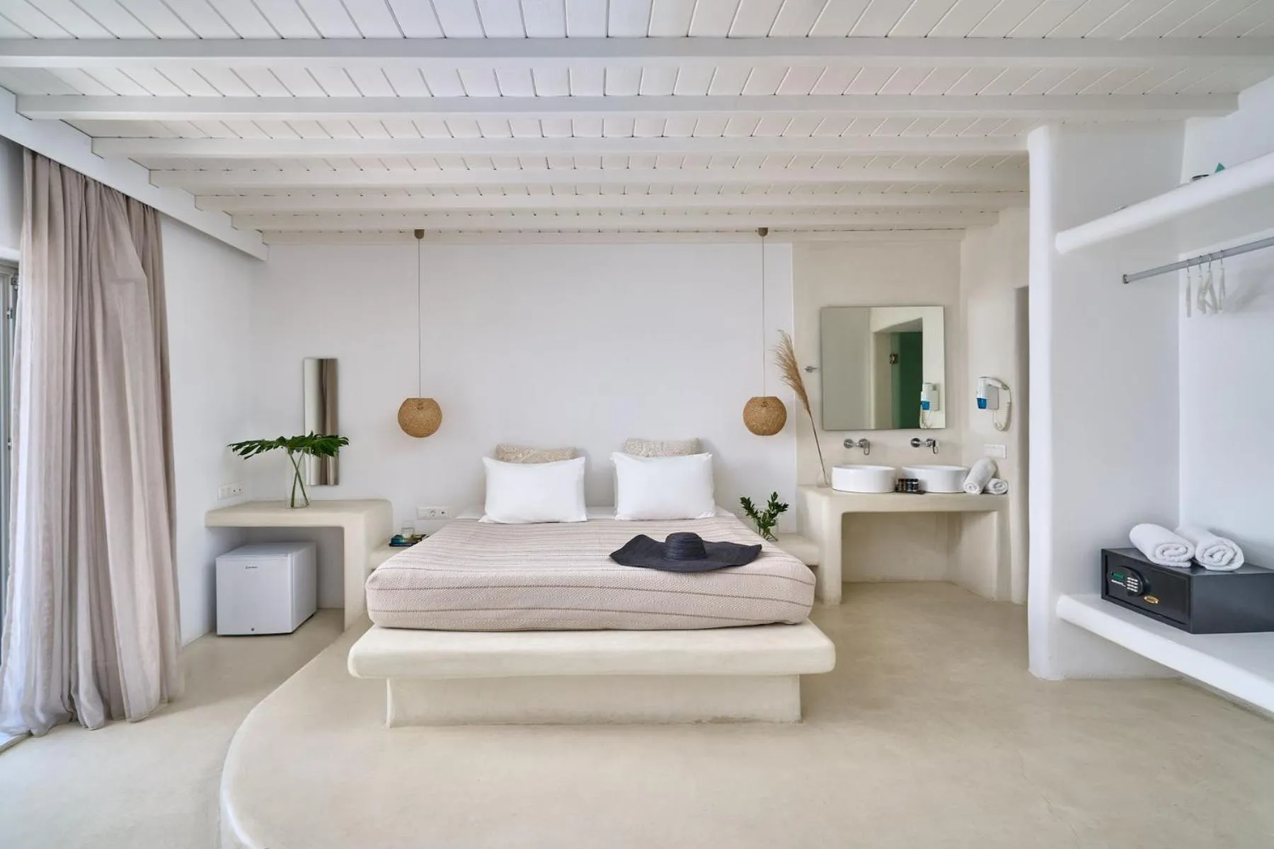 Bed in Paolas Τown Boutique Hotel