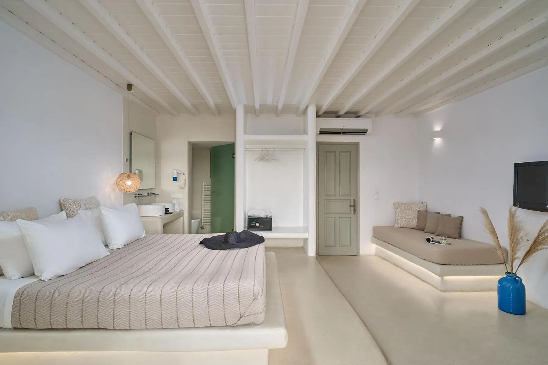 Bed in Paolas Τown Boutique Hotel