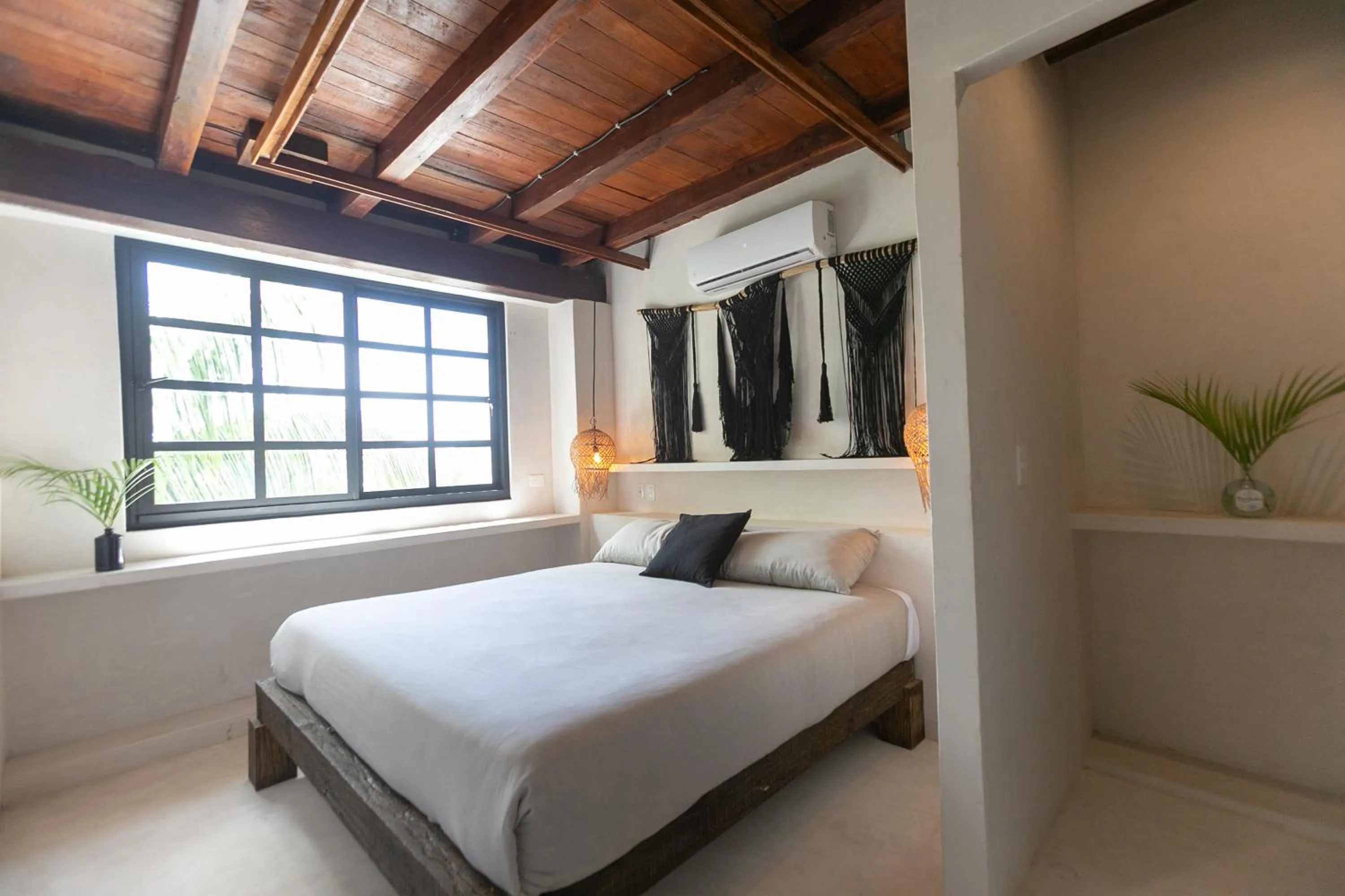 Bed in Mohave Jungle Rooms