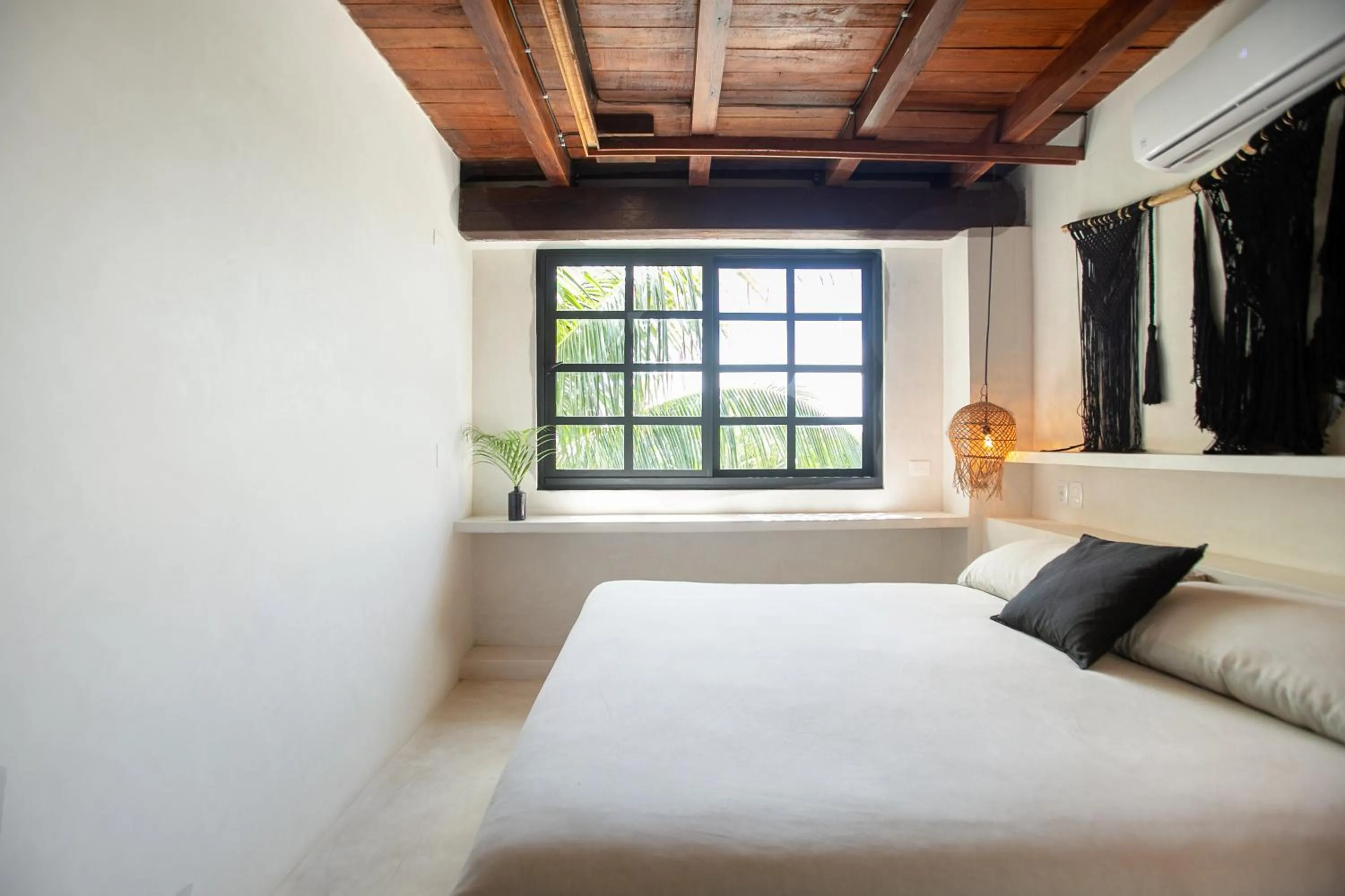 Bed in Mohave Jungle Rooms