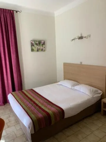 Bed in Hôtel Colombo- Porto Corse