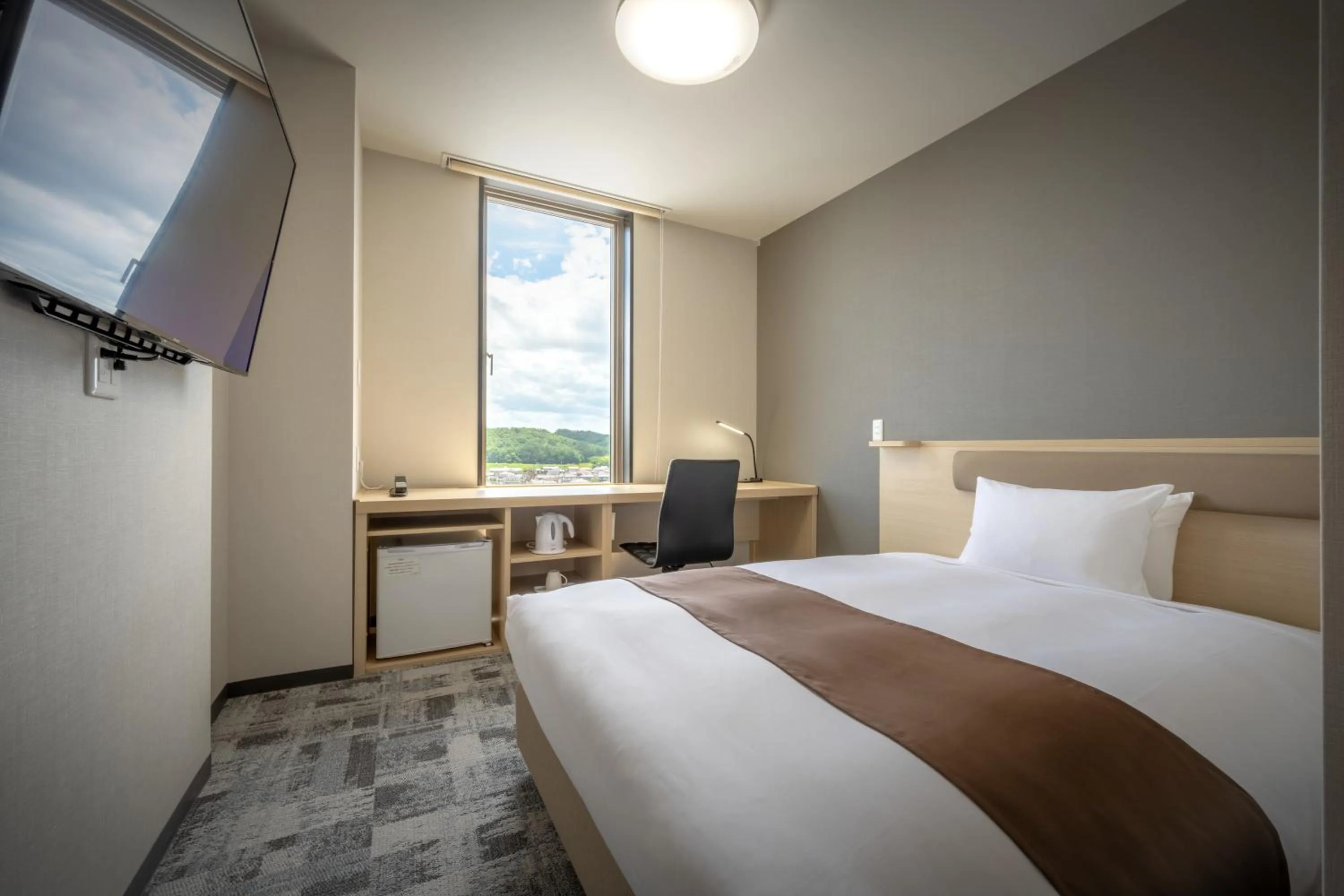 Photo of the whole room, Bed in Hotel Maruya Grande