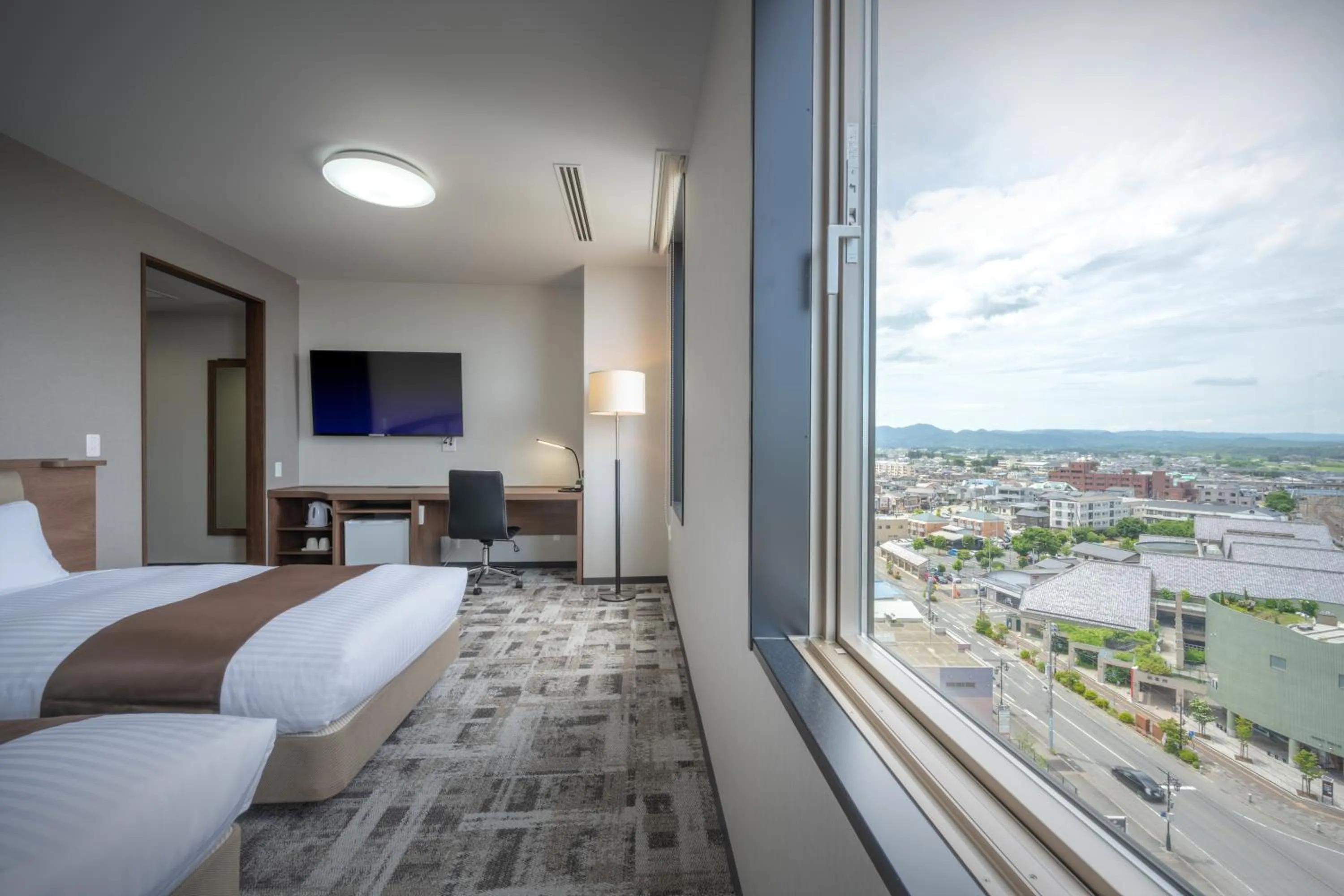 Photo of the whole room, Bed in Hotel Maruya Grande