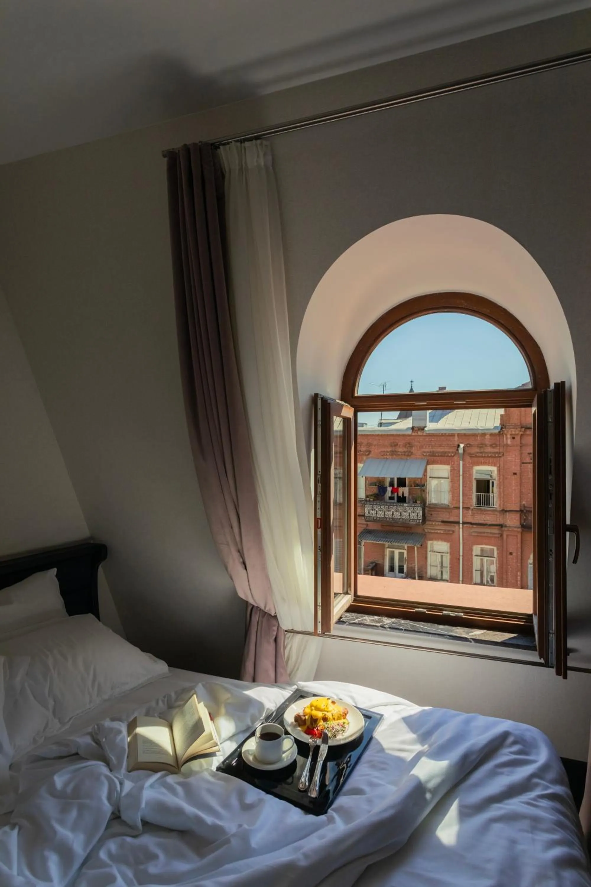 Bed in Puris Moedani Boutique Hotel