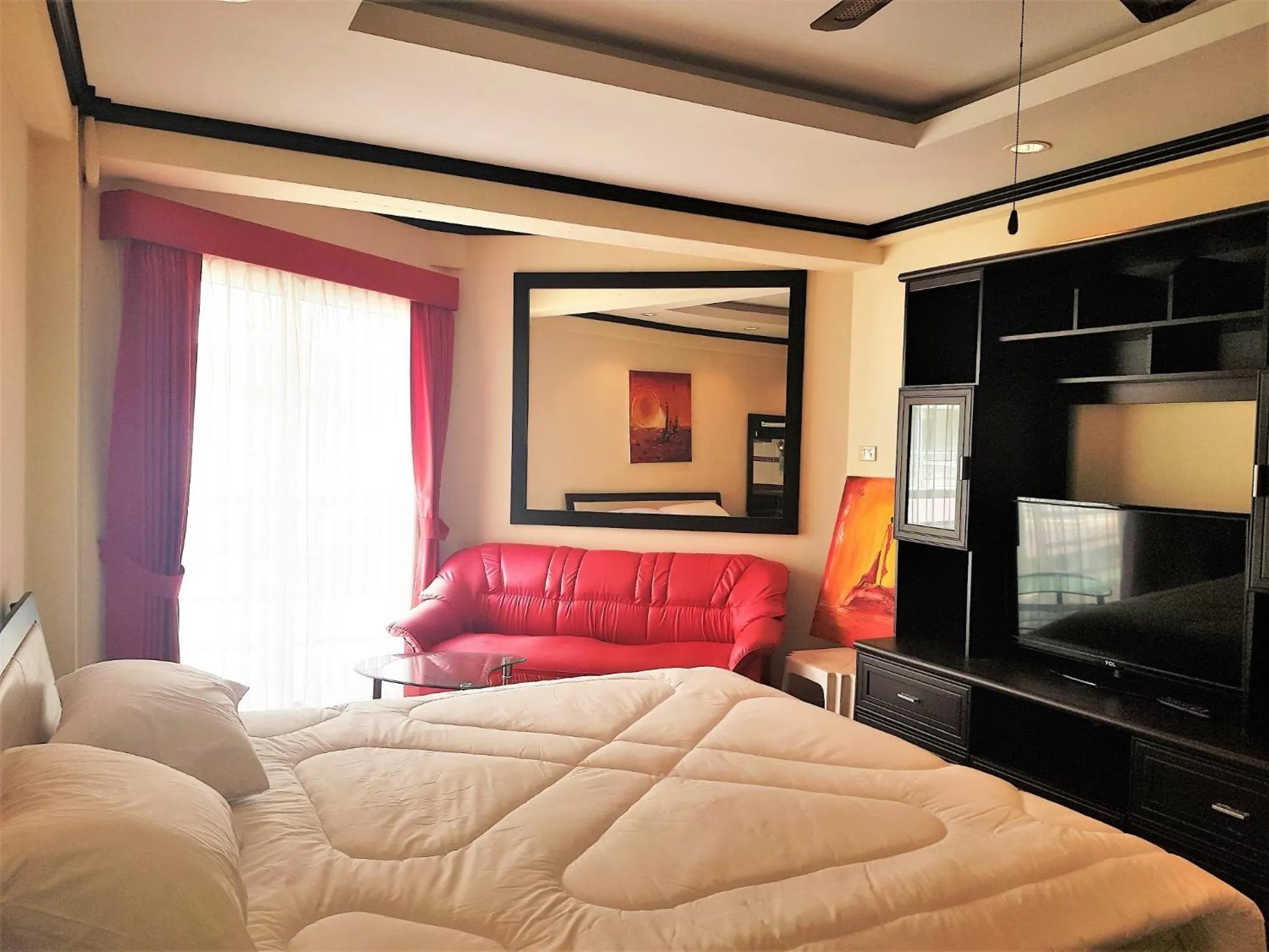 Seating area, Bed in Jomtien beach condo sea view studio apartment 12th floor