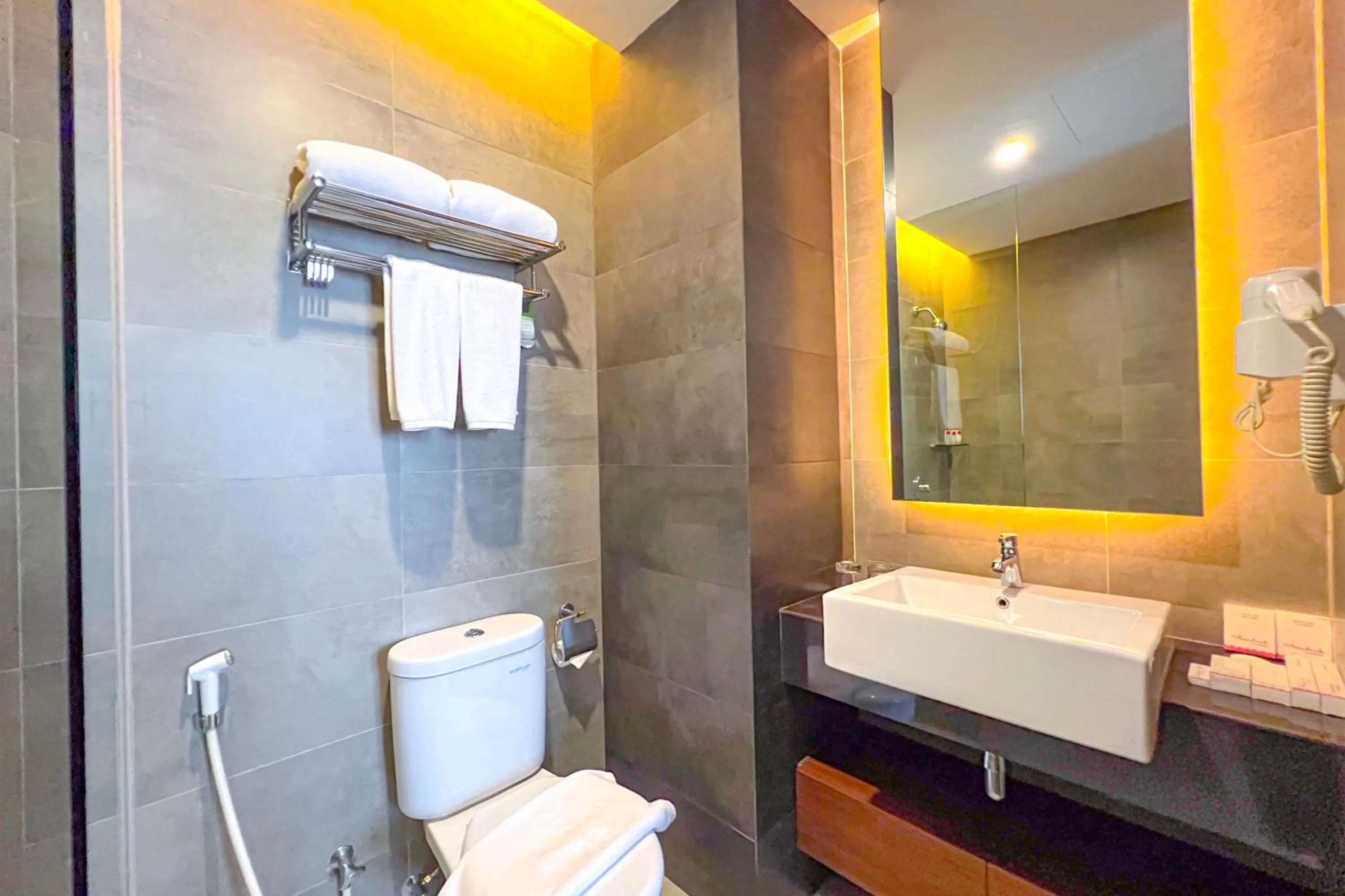 Bathroom in Asialink Hotel Batam by Prasanthi