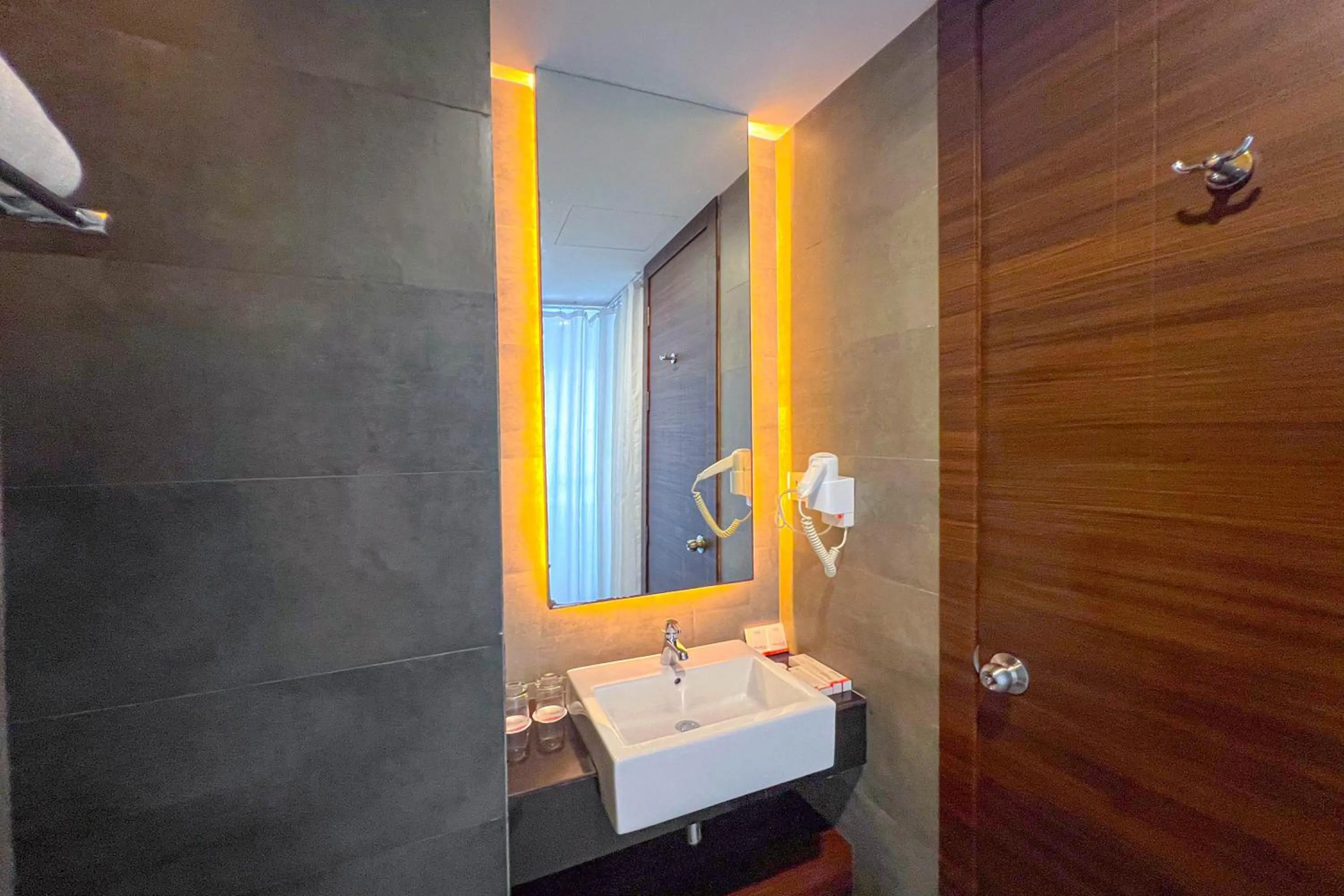 Bathroom in Asialink Hotel Batam by Prasanthi