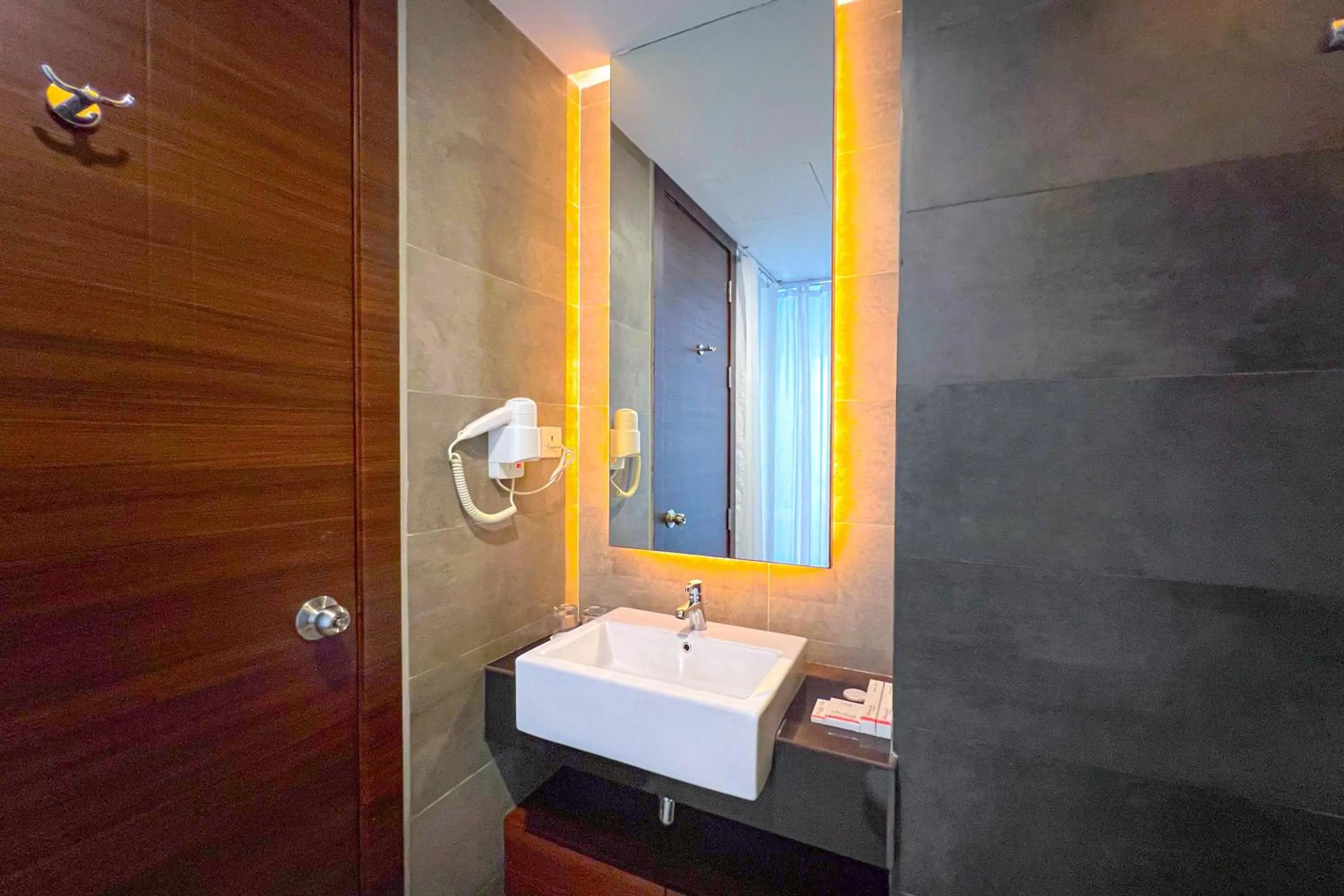 Bathroom in Asialink Hotel Batam by Prasanthi