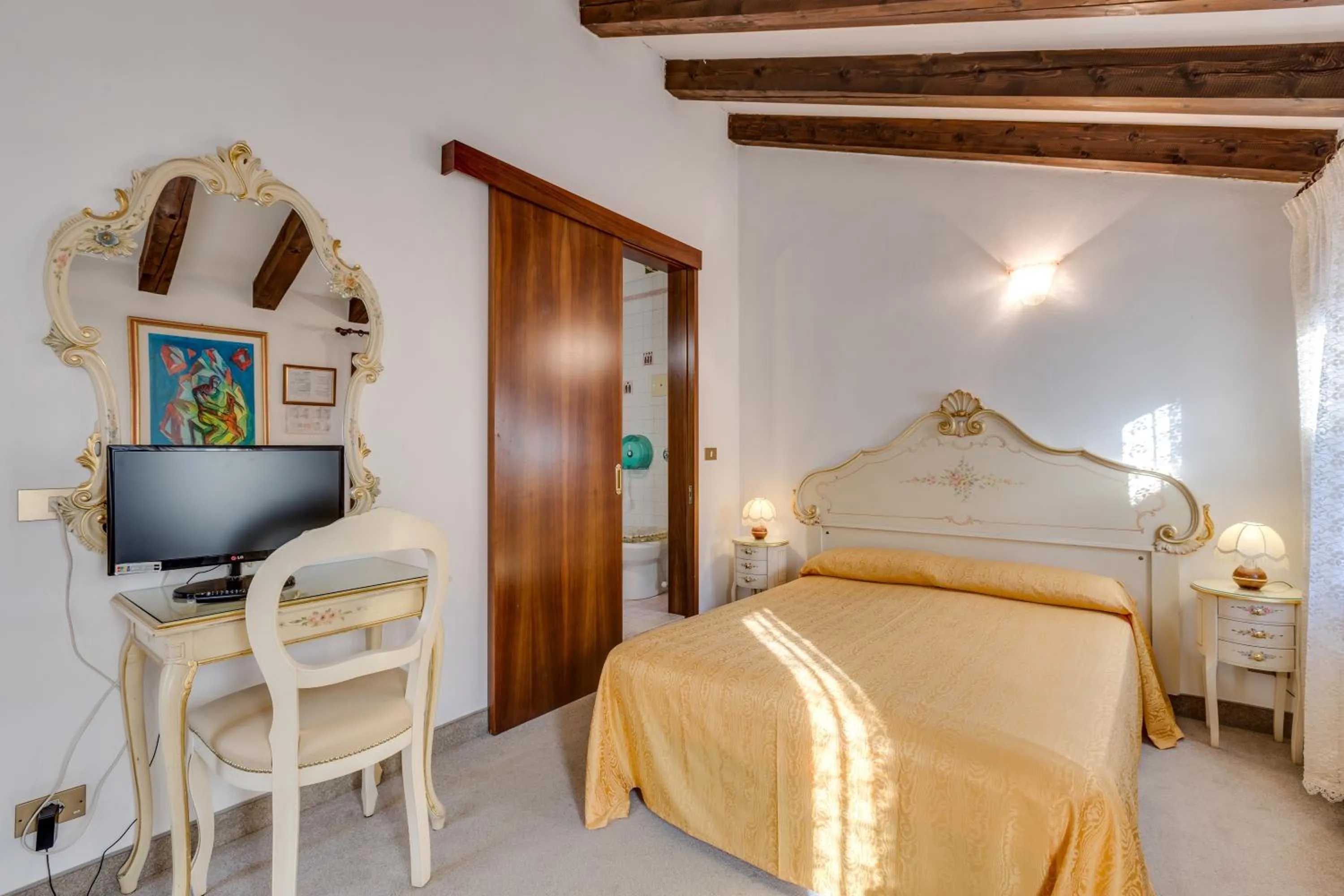 Bed in Hotel Bernardi Semenzato