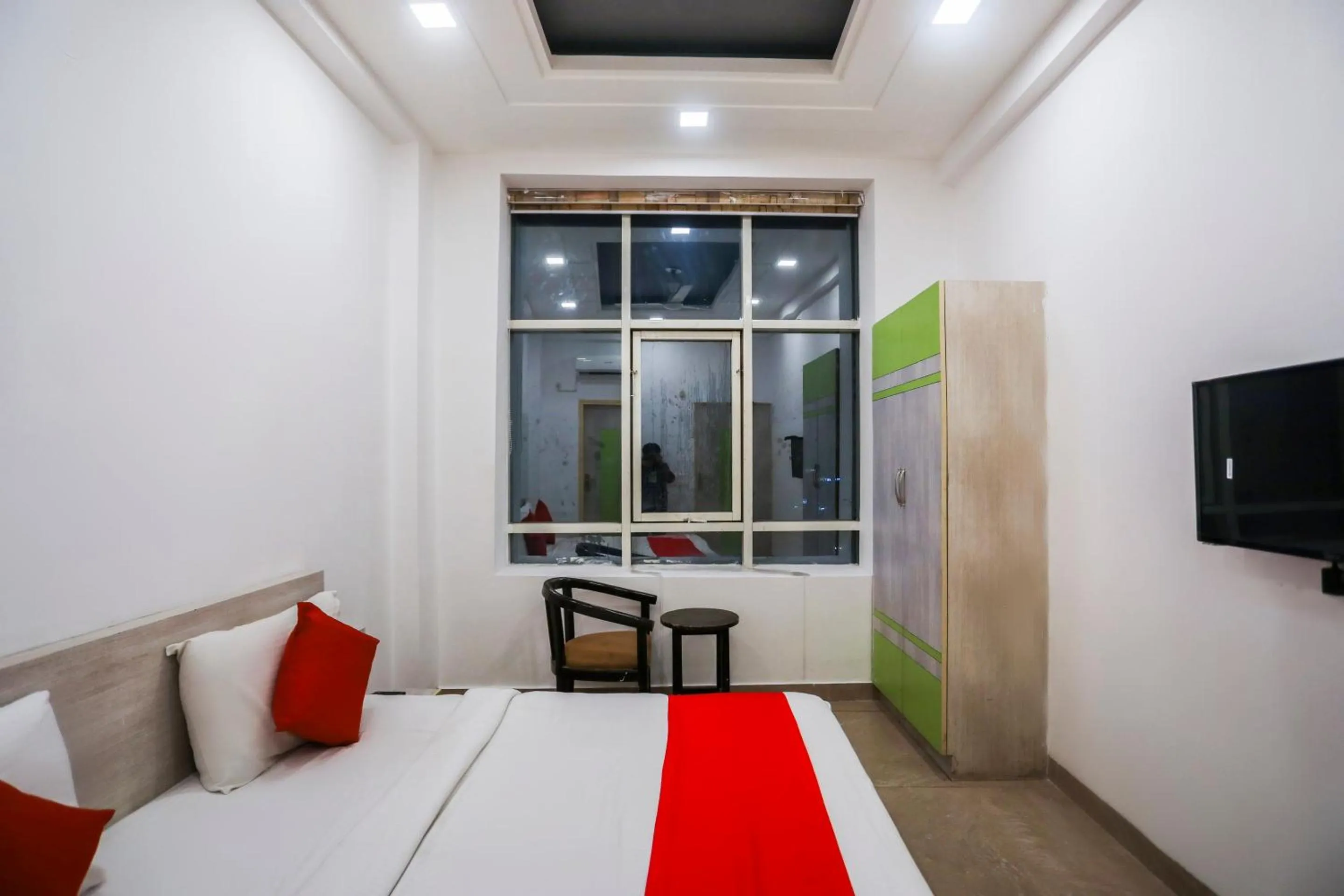 Bedroom in OYO Cladis Near Mall Of India