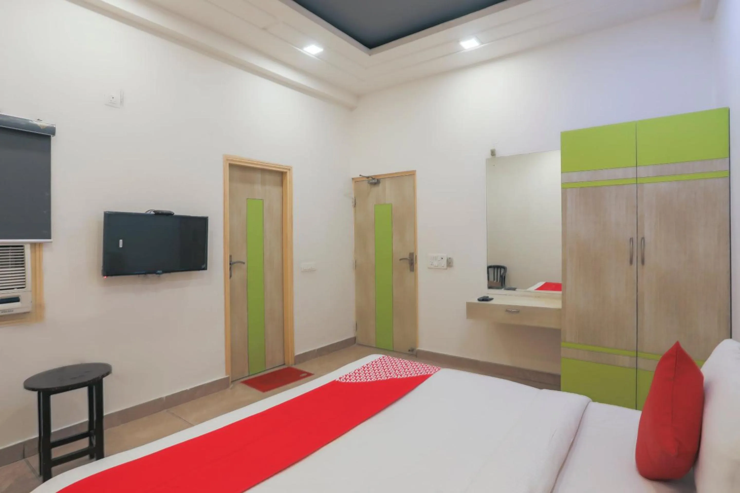 Bedroom in OYO Cladis Near Mall Of India