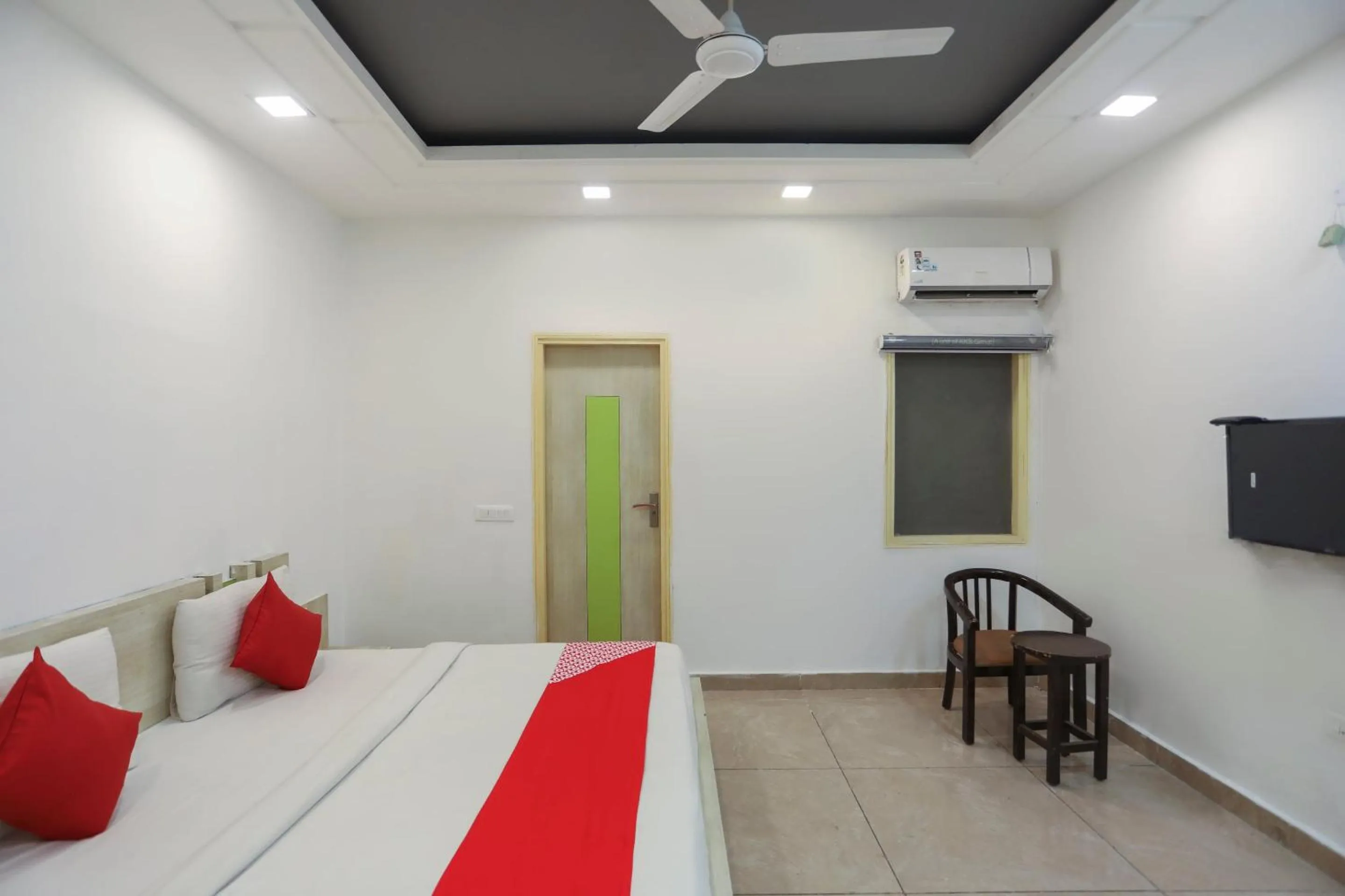 Bedroom in OYO Cladis Near Mall Of India