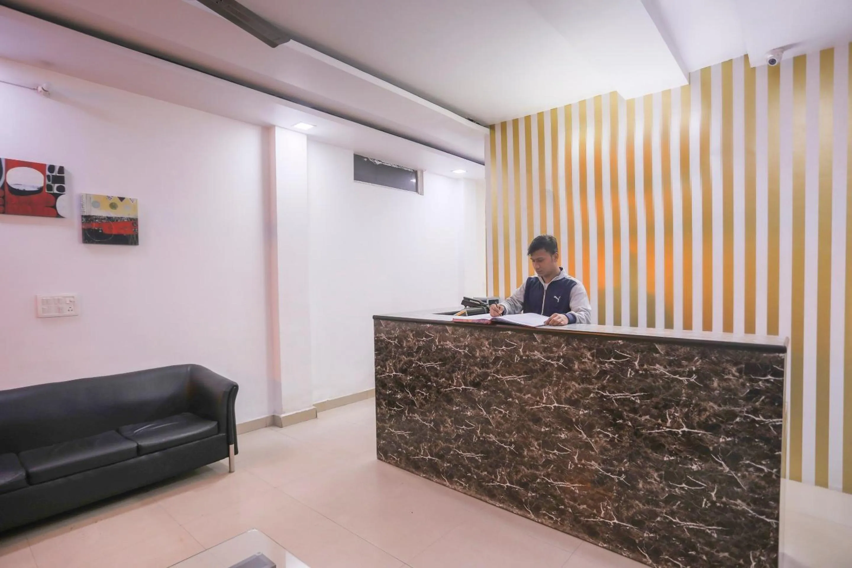 Lobby or reception in OYO Cladis Near Mall Of India