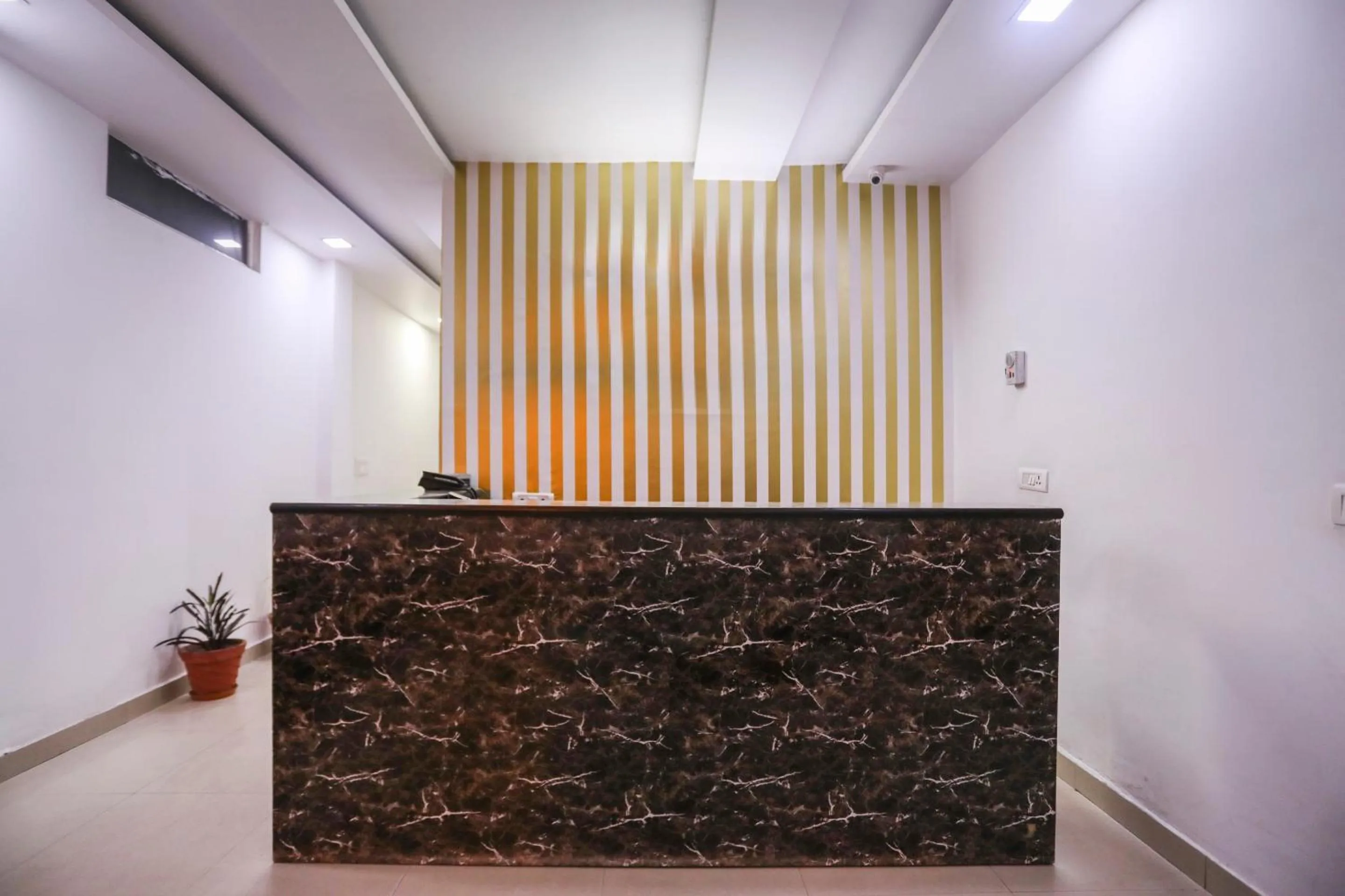 Lobby or reception in OYO Cladis Near Mall Of India