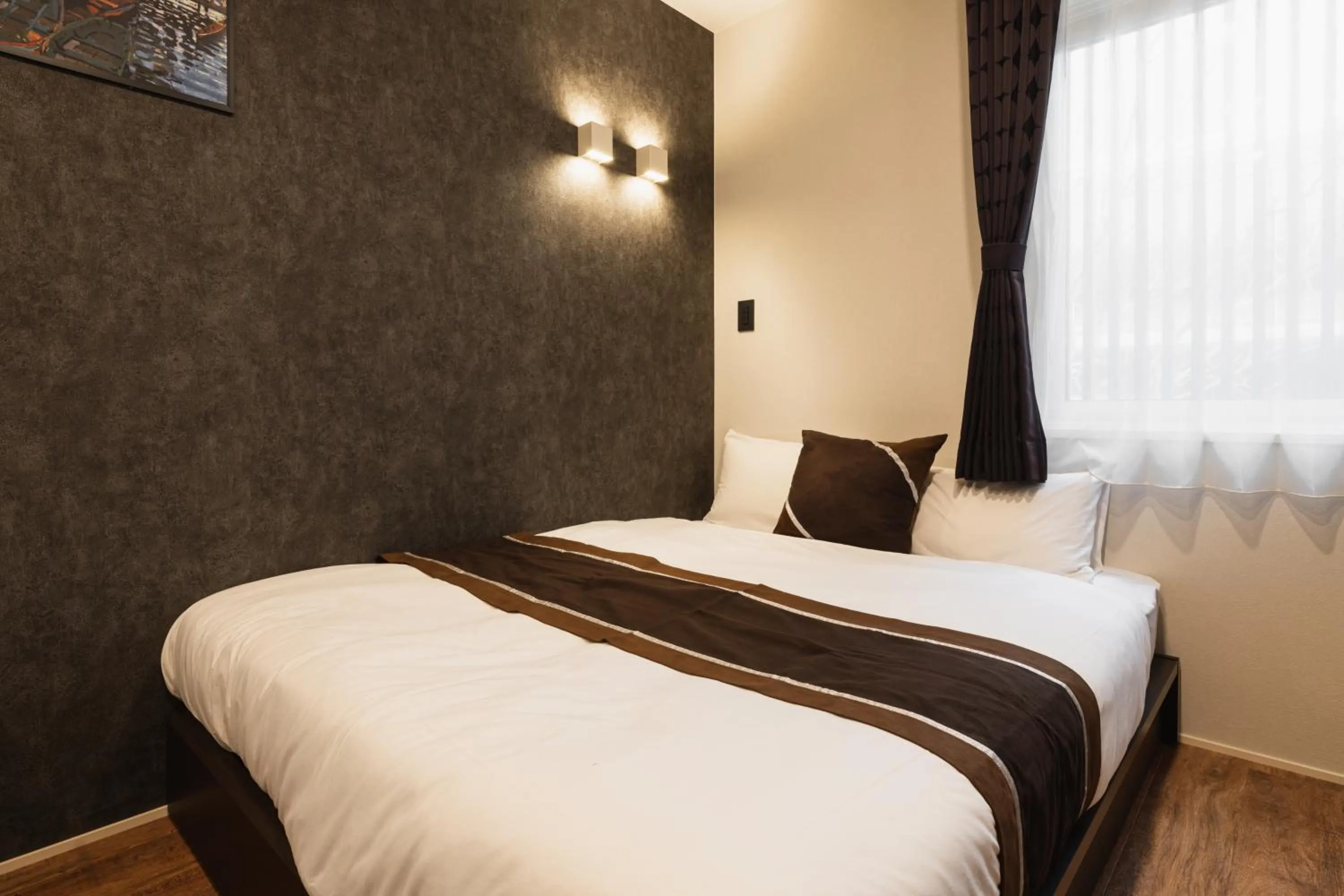 Bed in GRAND BASE Nagasaki