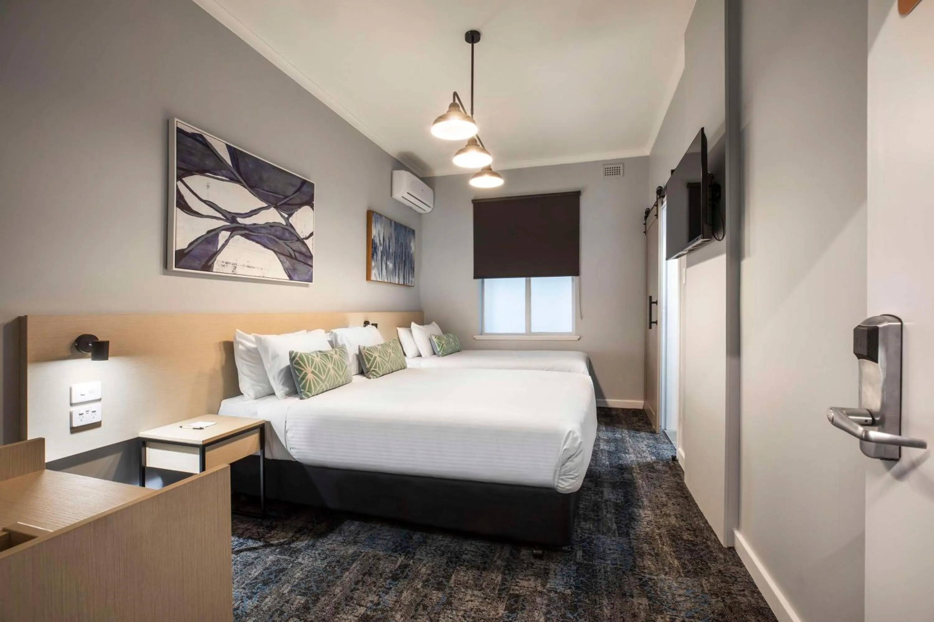 Bedroom, Bed in Nightcap at Rex Hotel