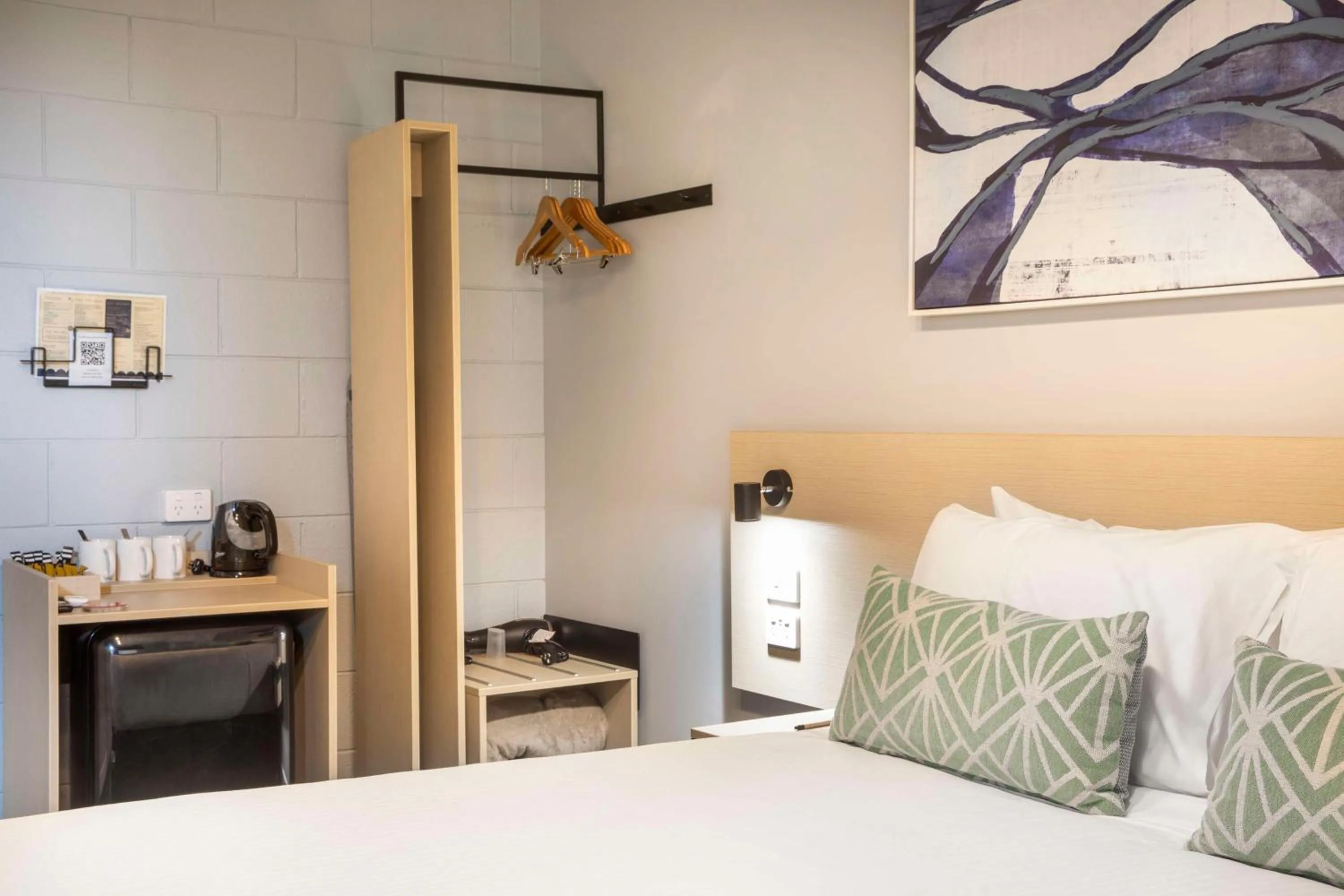 Bedroom, Bed in Nightcap at Rex Hotel