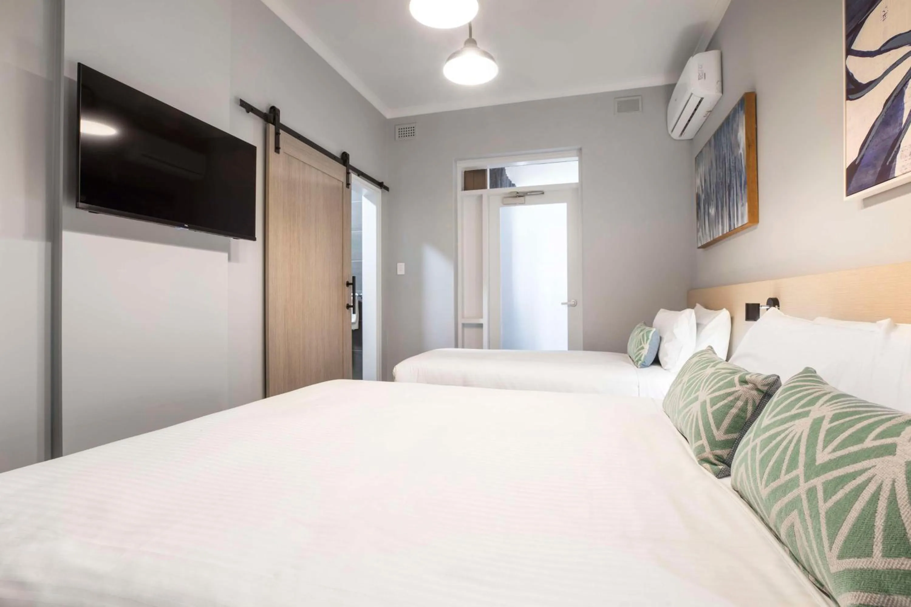 Bedroom, Bed in Nightcap at Rex Hotel