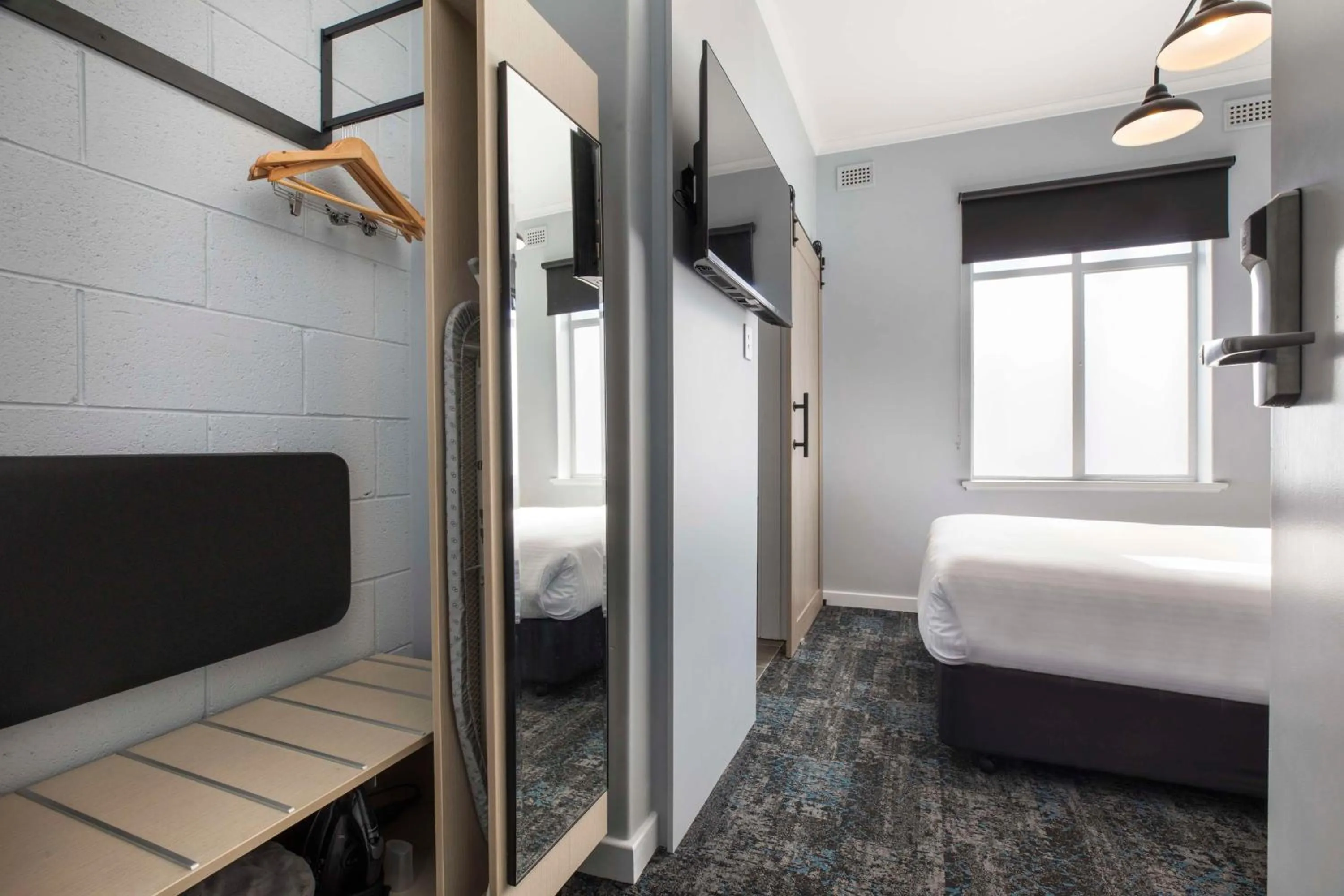 Bedroom, Bed in Nightcap at Rex Hotel