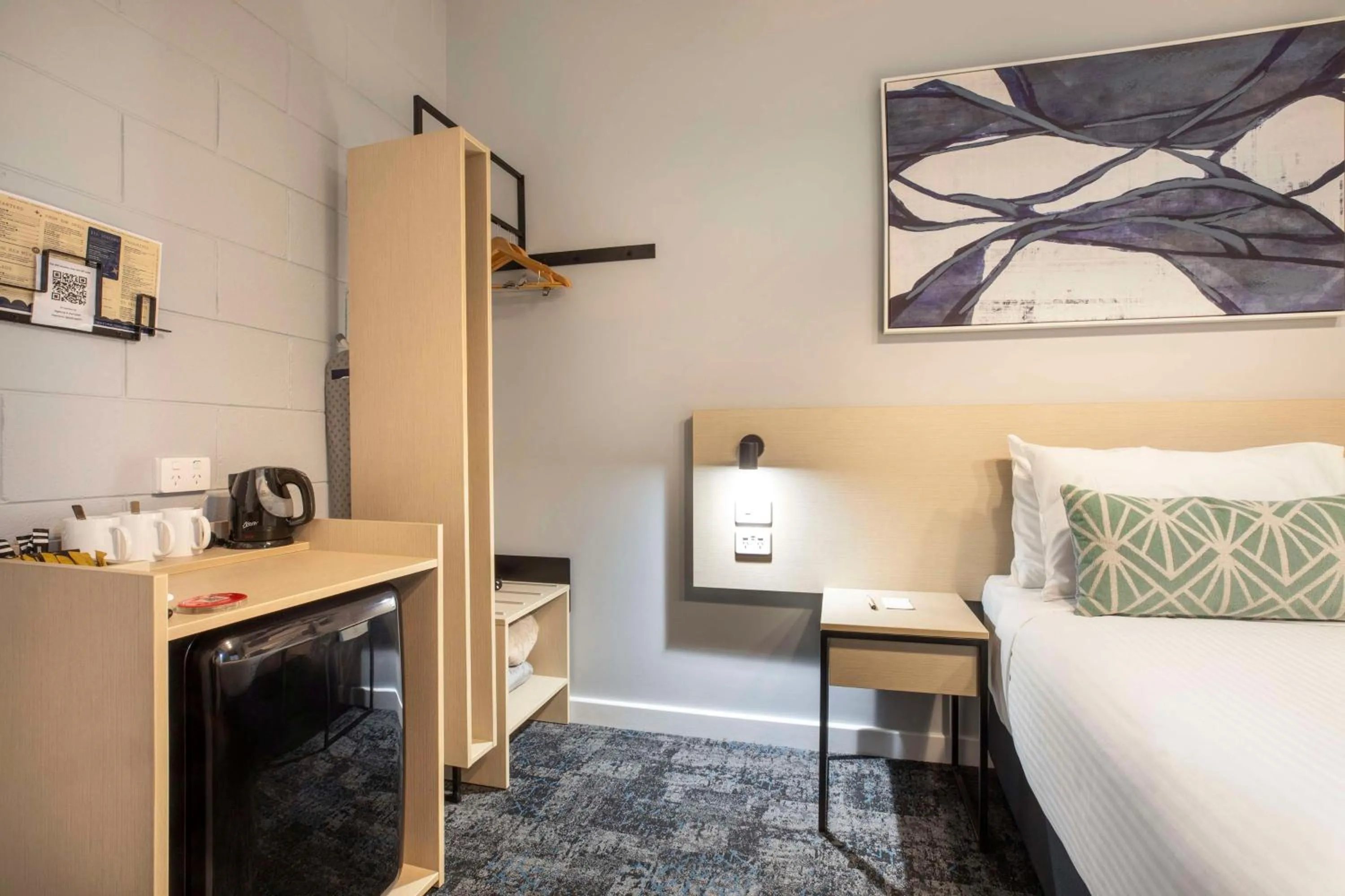 Bedroom, Bed in Nightcap at Rex Hotel