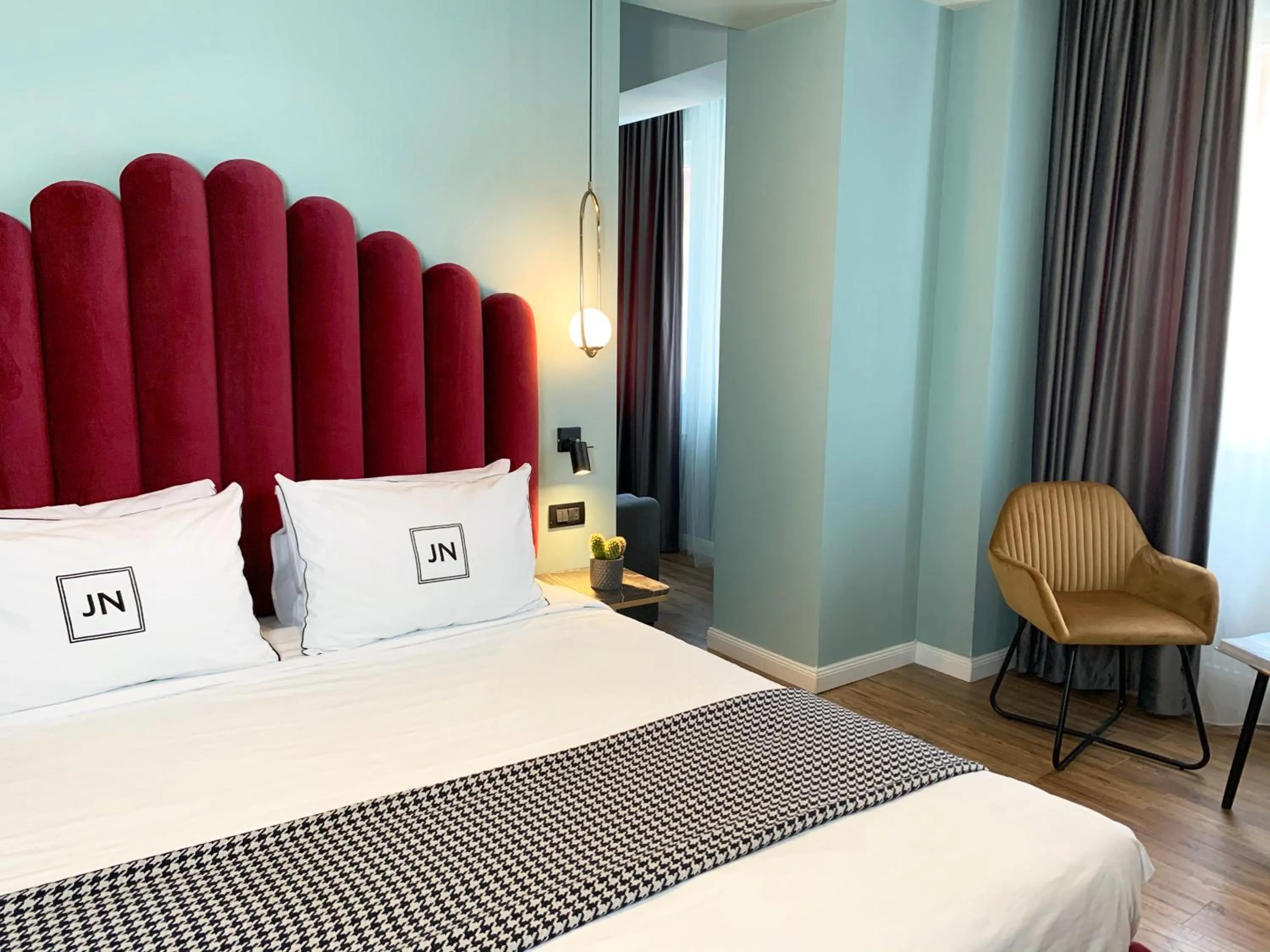 Bed in JN Boutique Hotel