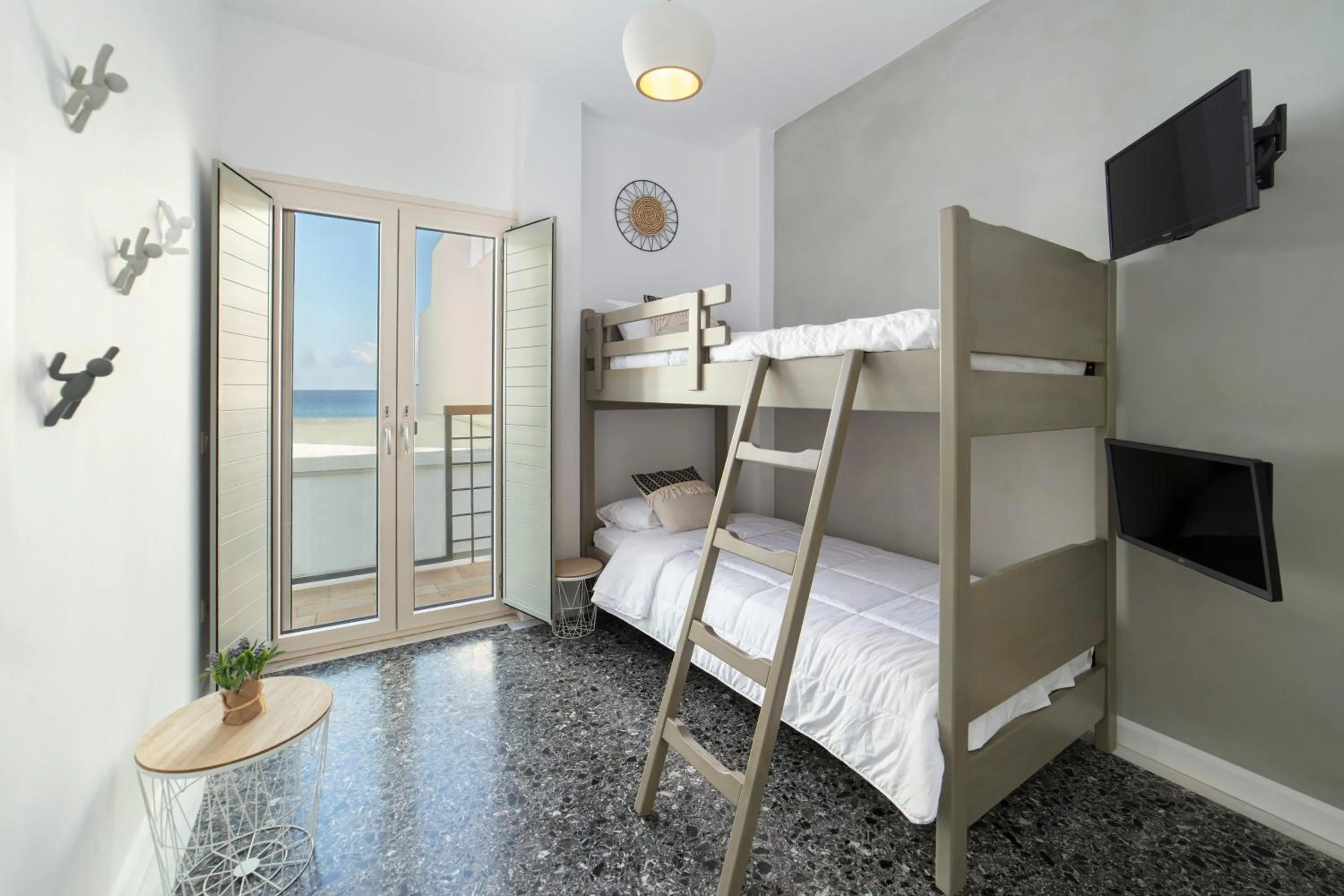 Bed in Andros 4 All Seasons Villas & Suites