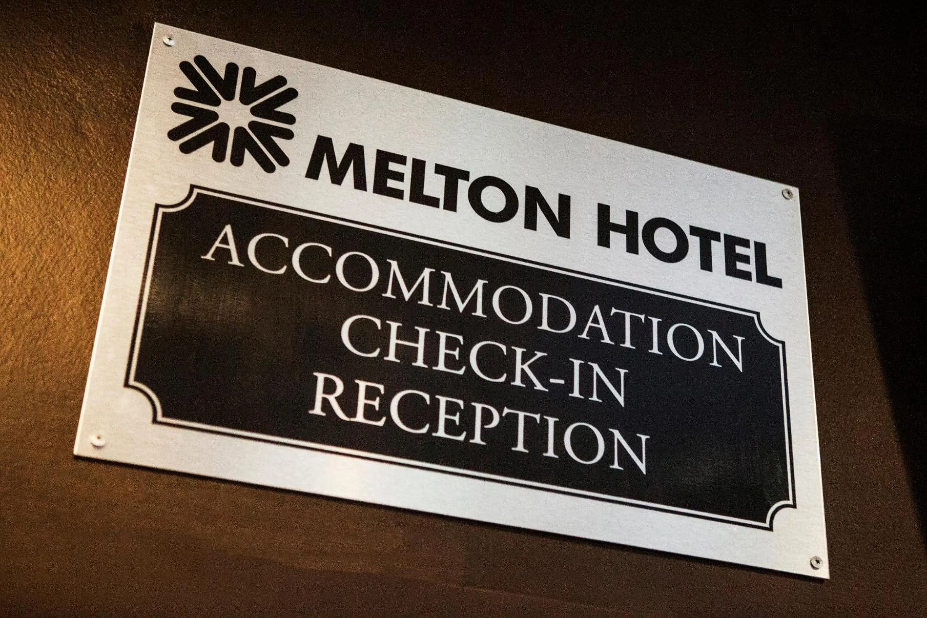 Property logo or sign in Melton Hotel Auburn