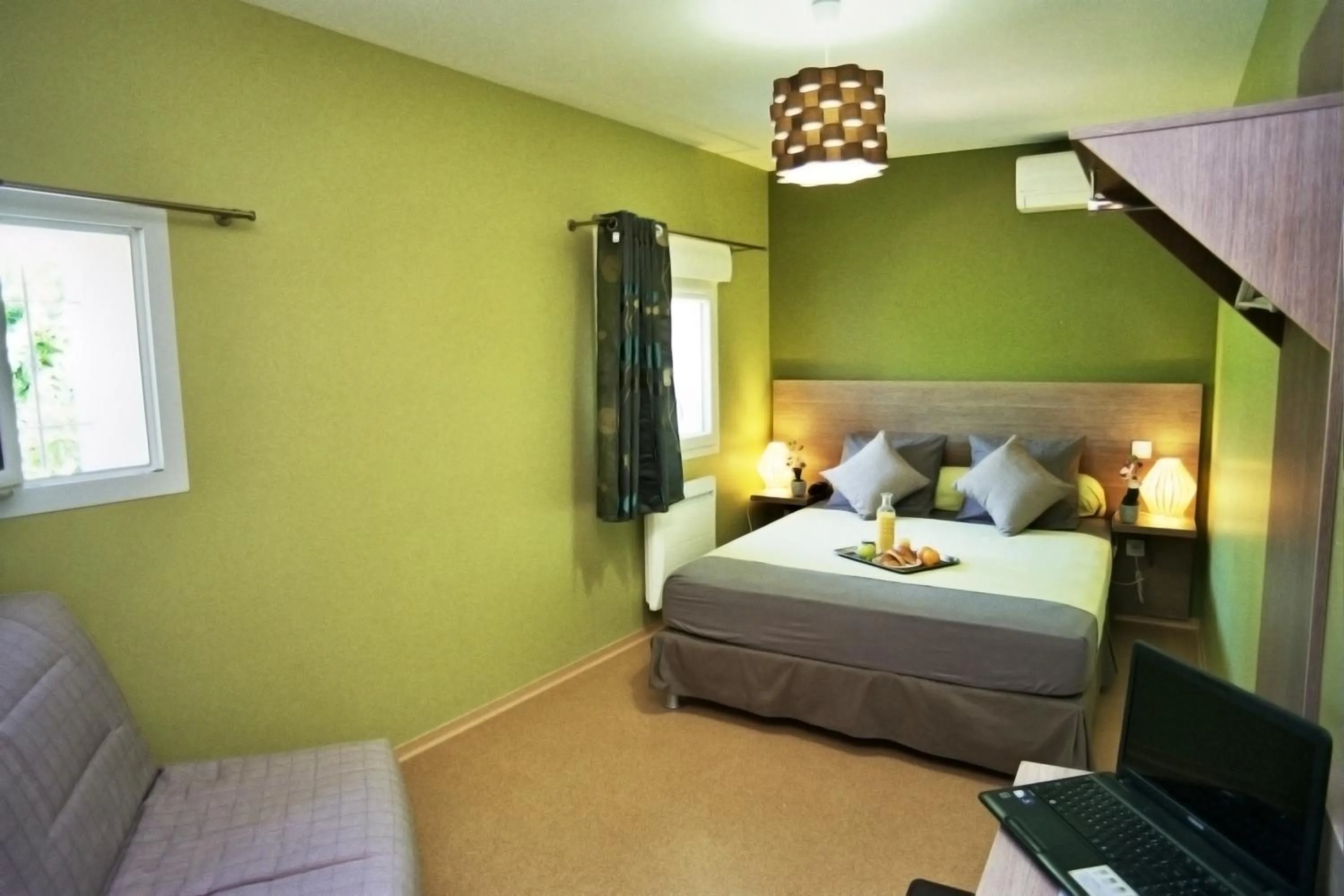 Bed in Hôtel l'Anvia