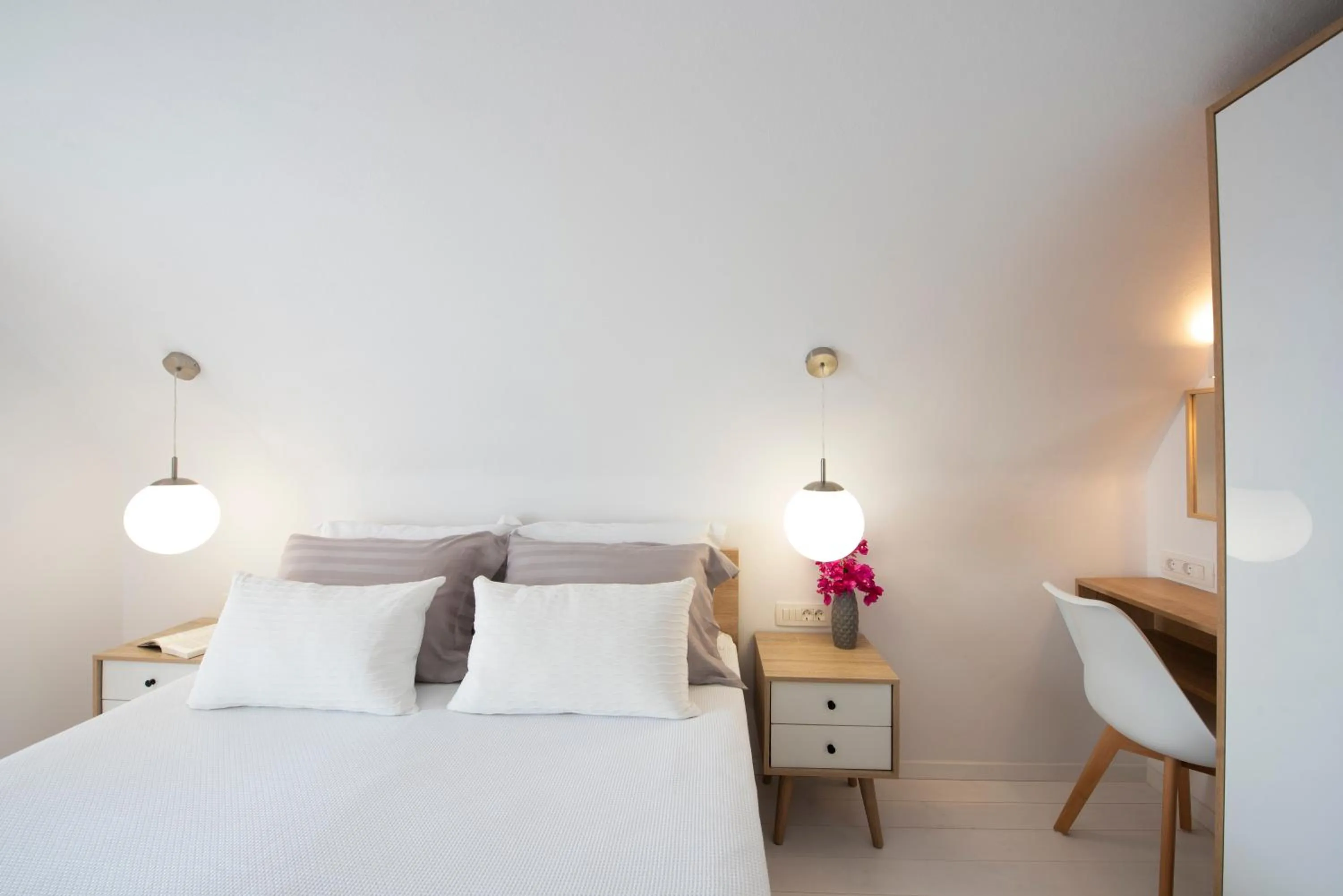 Bed in White Orchid Suites