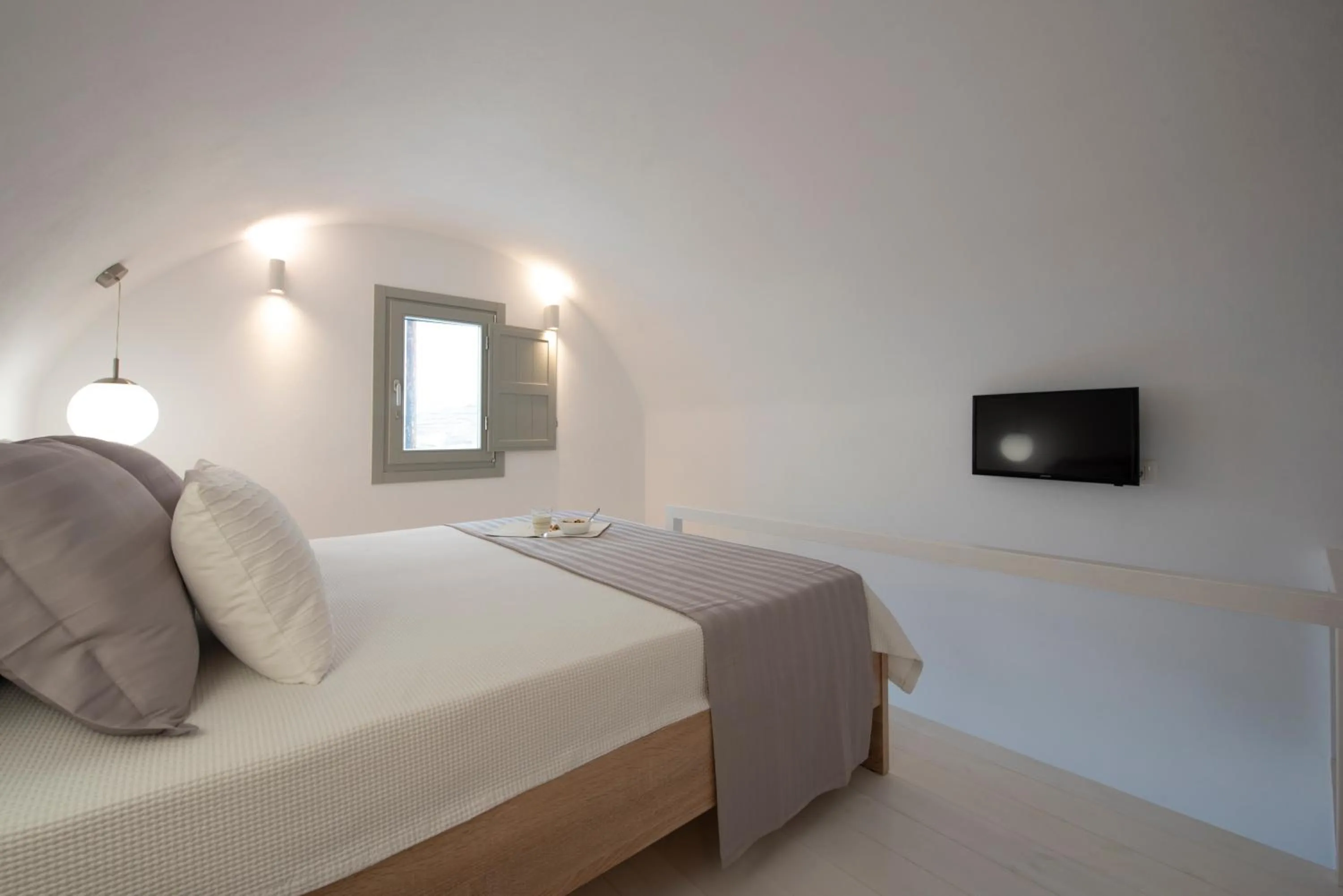 Bed in White Orchid Suites