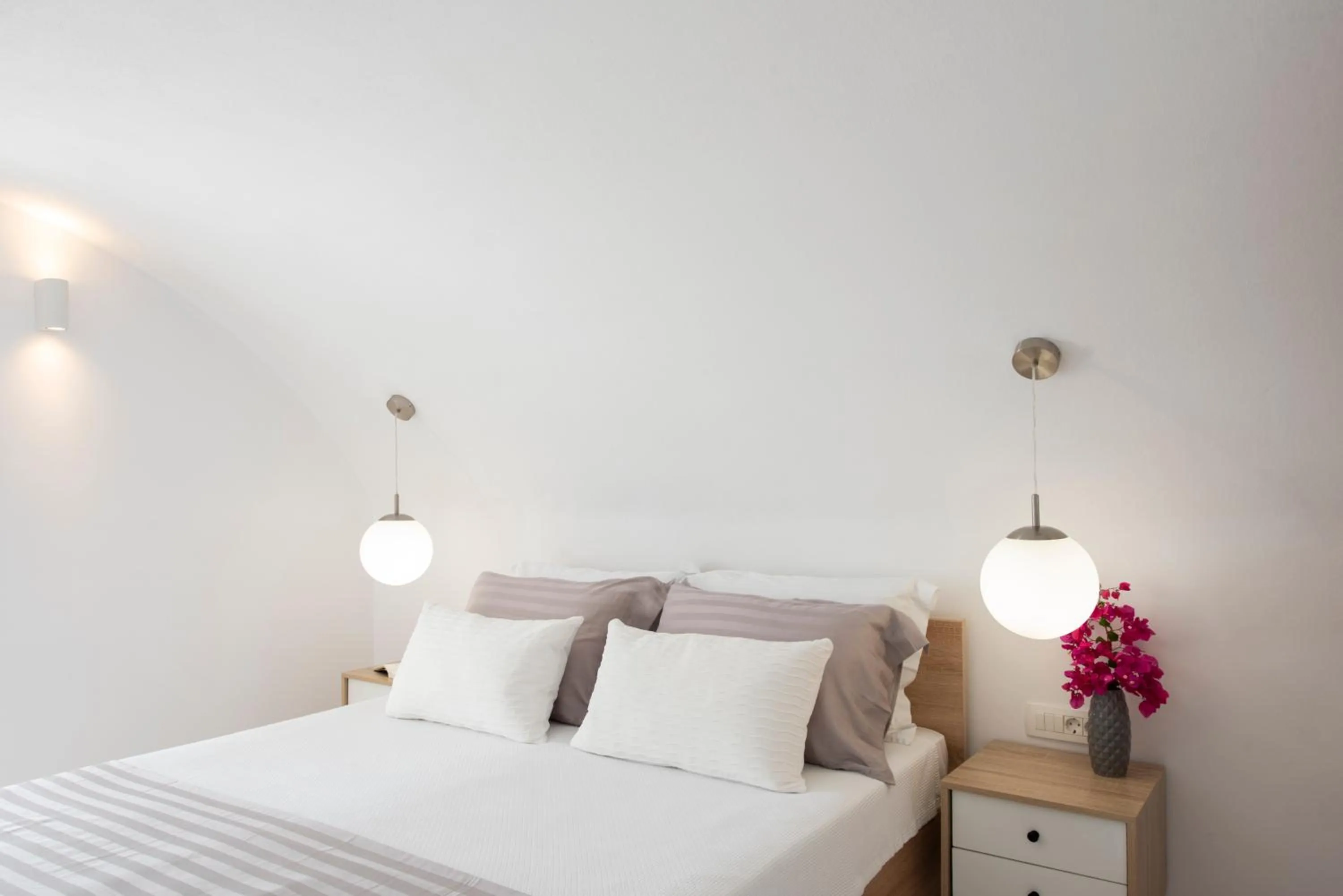 Bed in White Orchid Suites