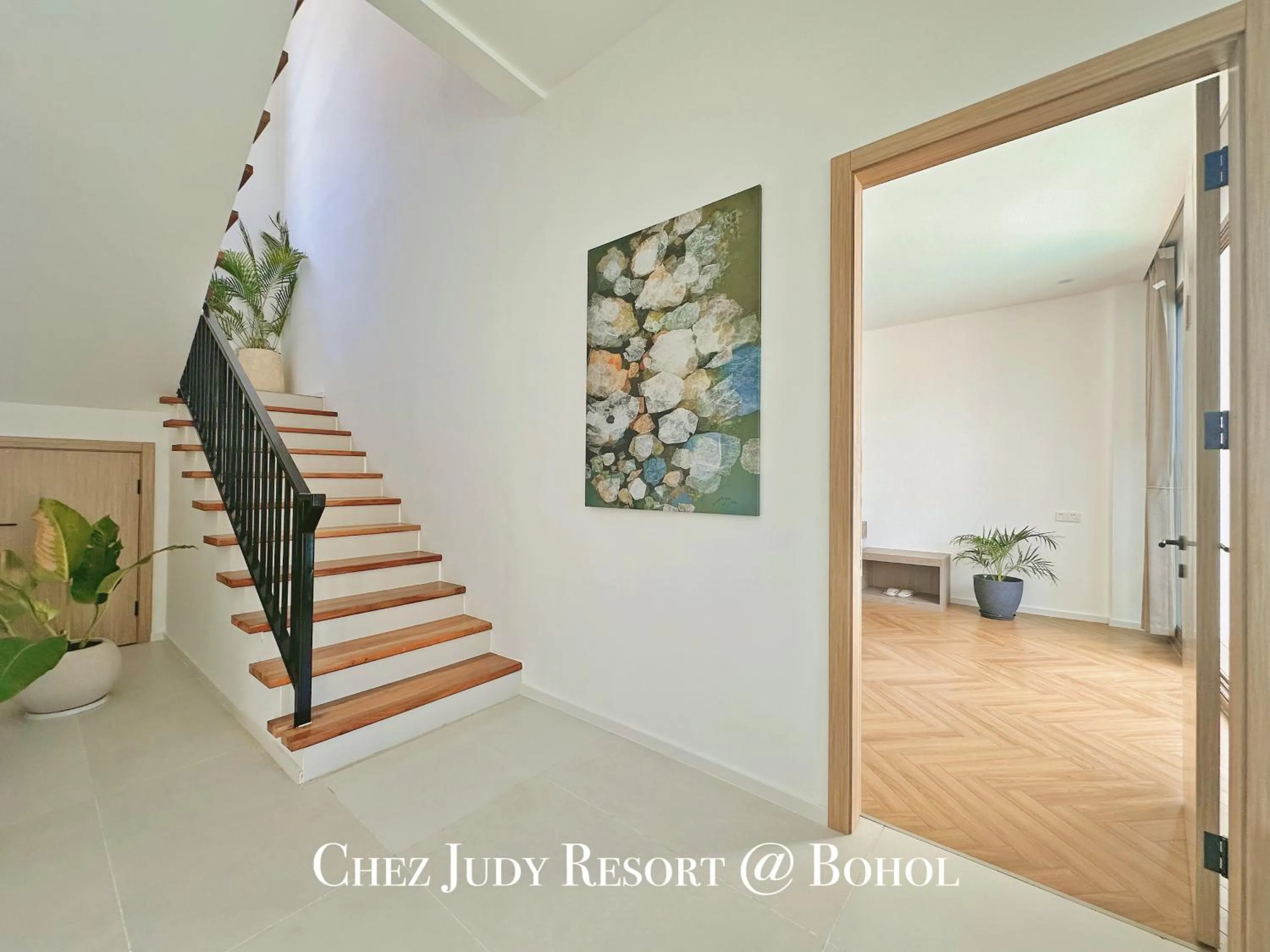 Text overlay in Chez Judy Resort