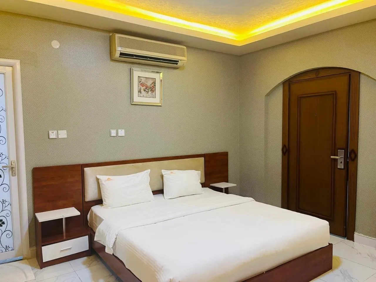 Bed in Grand Inn Hotel