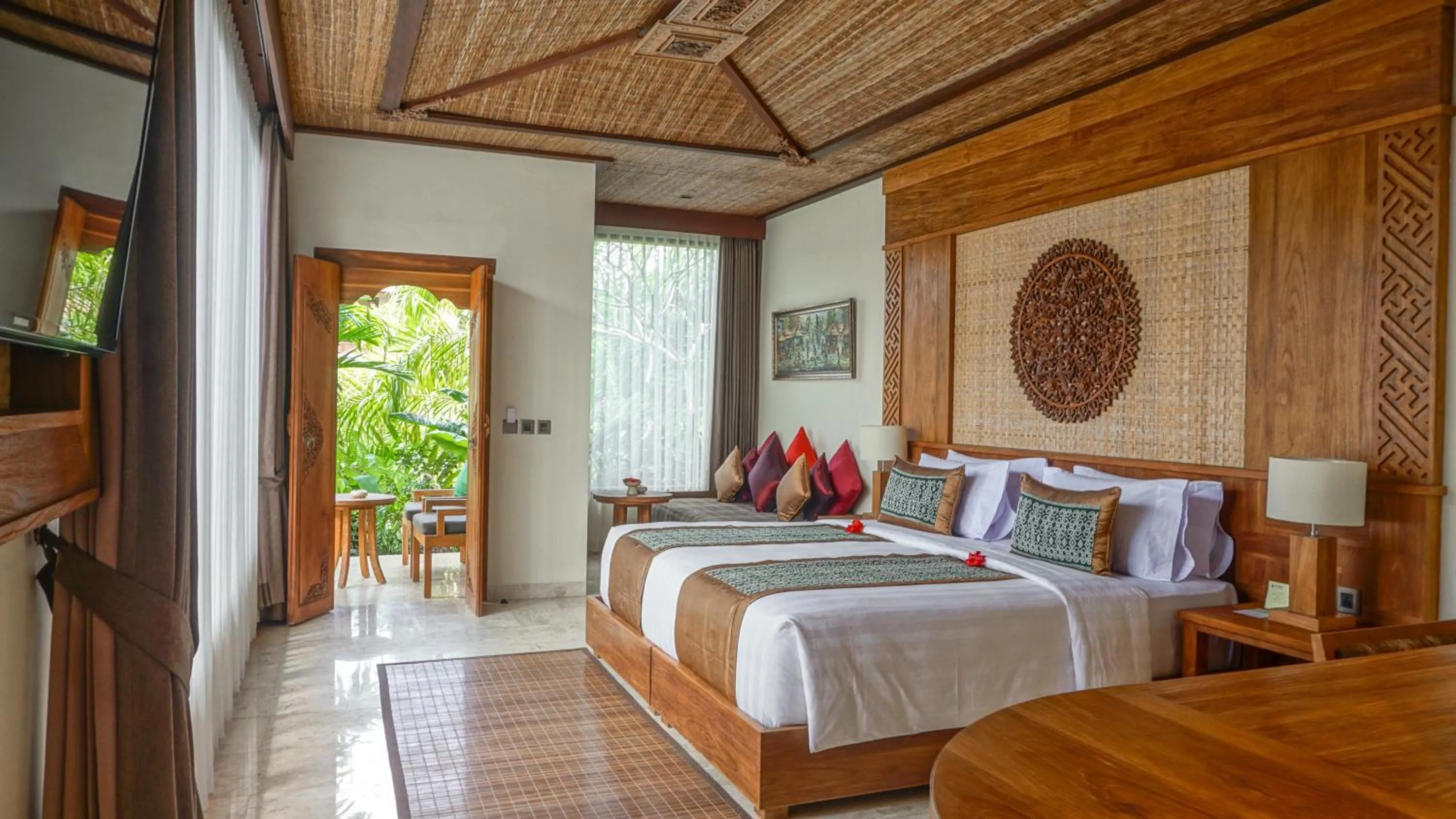 Bed in Sakti Garden Resort & Spa
