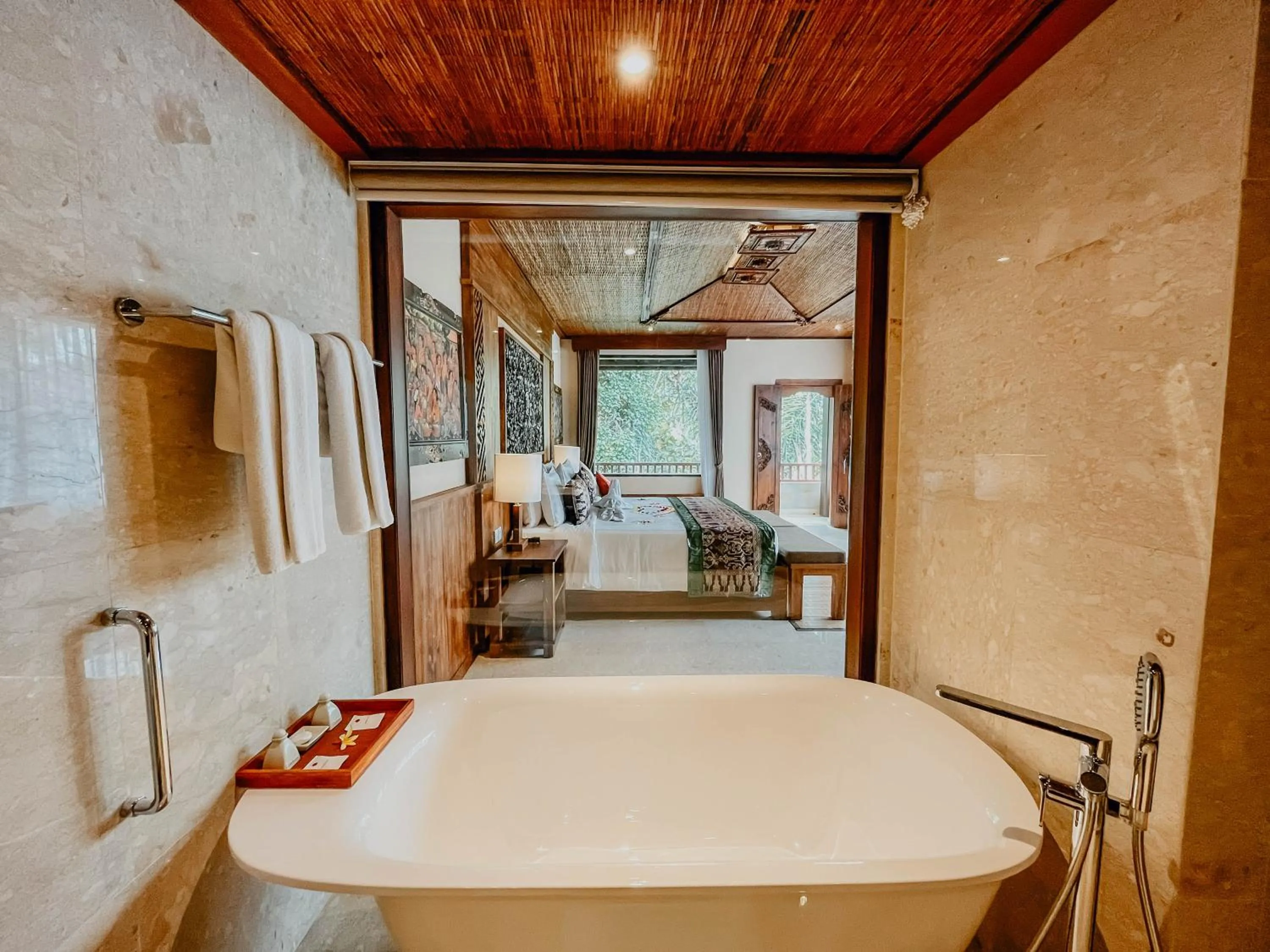 Bed in Sakti Garden Resort & Spa